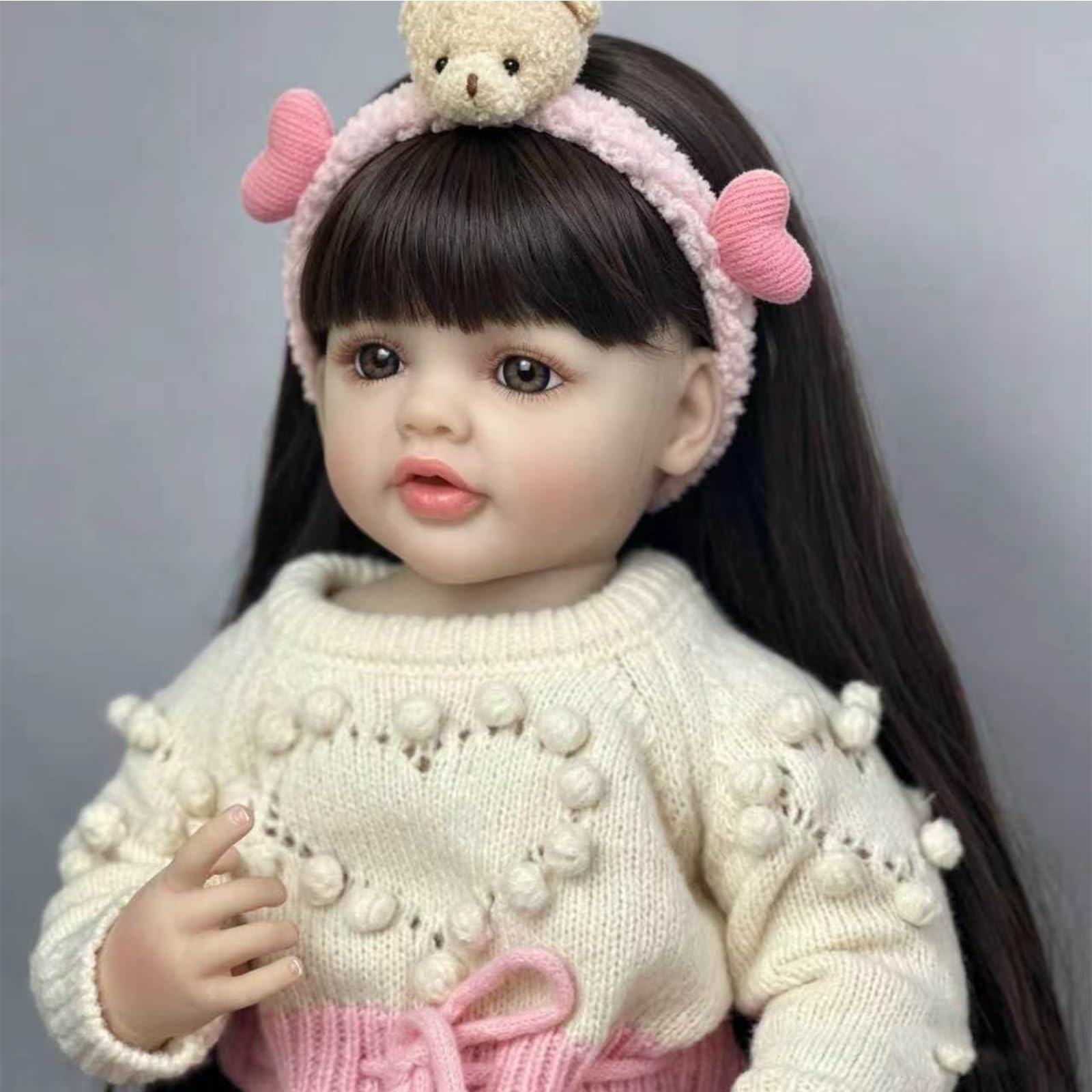 Reborn Lalka 55 cm Realistyczne Dziecko Miękki Silikonowy Winyl, Noworodek Dziewczyna Z Ruchomymi Stawami, Długie Brązowe Włosy, Różowy Strój Z Akcesoriami