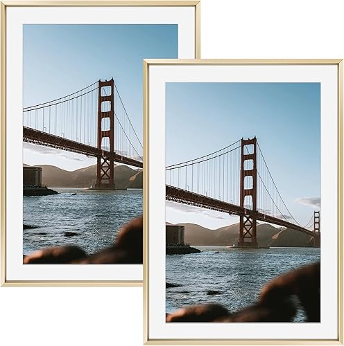 Vista 236 de Frametory - Colección de marcos de metal para fotos, marco de aluminio para fotos con alfombrilla de color marfil y cristal real Dorado