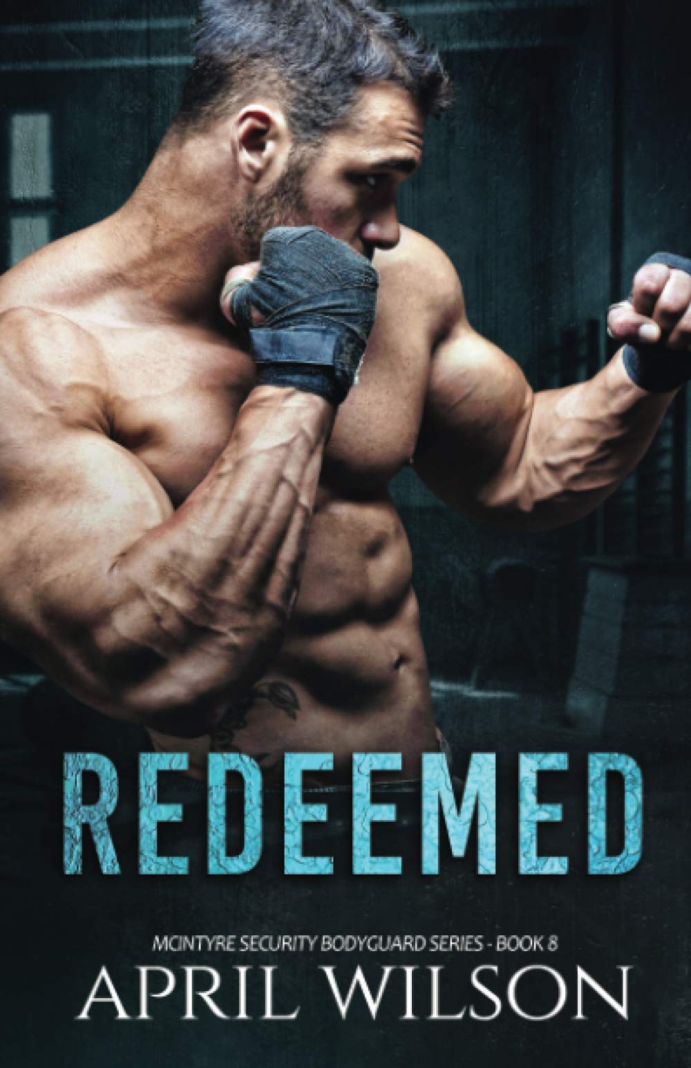 Redeemed: (McIntyre Security Bodyguard Series - Book 8)