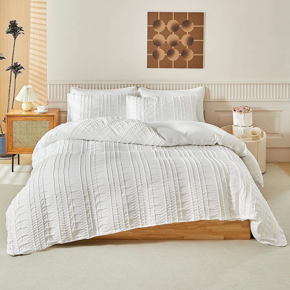 Housse de couette 230x260 blanche plissée pour un lit douillet style hôtel
