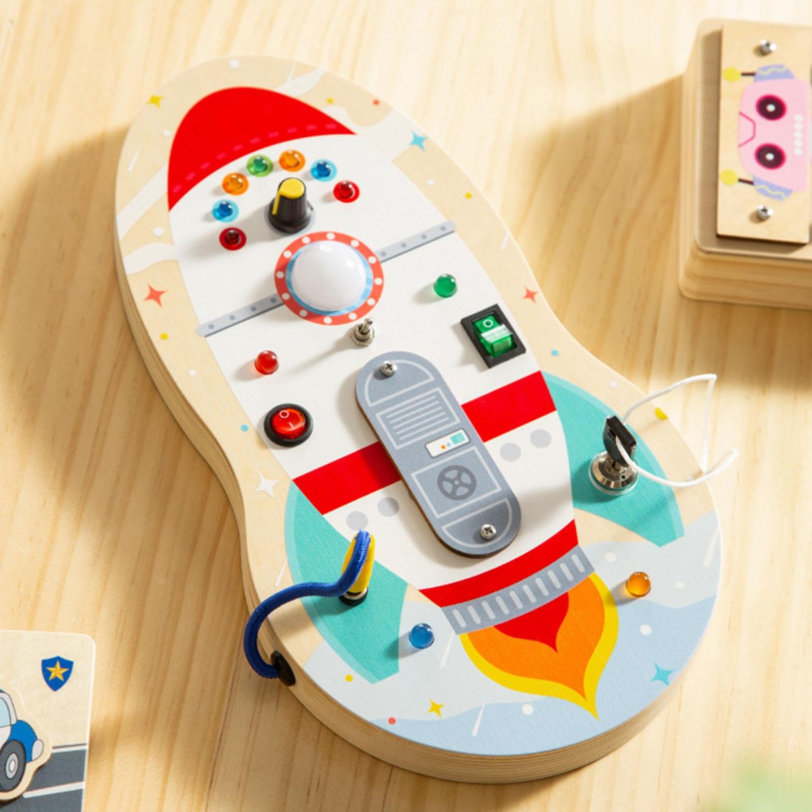 Busy Board Lernspielzeug Kinder LED Schalterbrett Steckdose Feinmotorik Förderung Handwerksaktivitäten aus Holz für Vorschule Reisen, Rakete