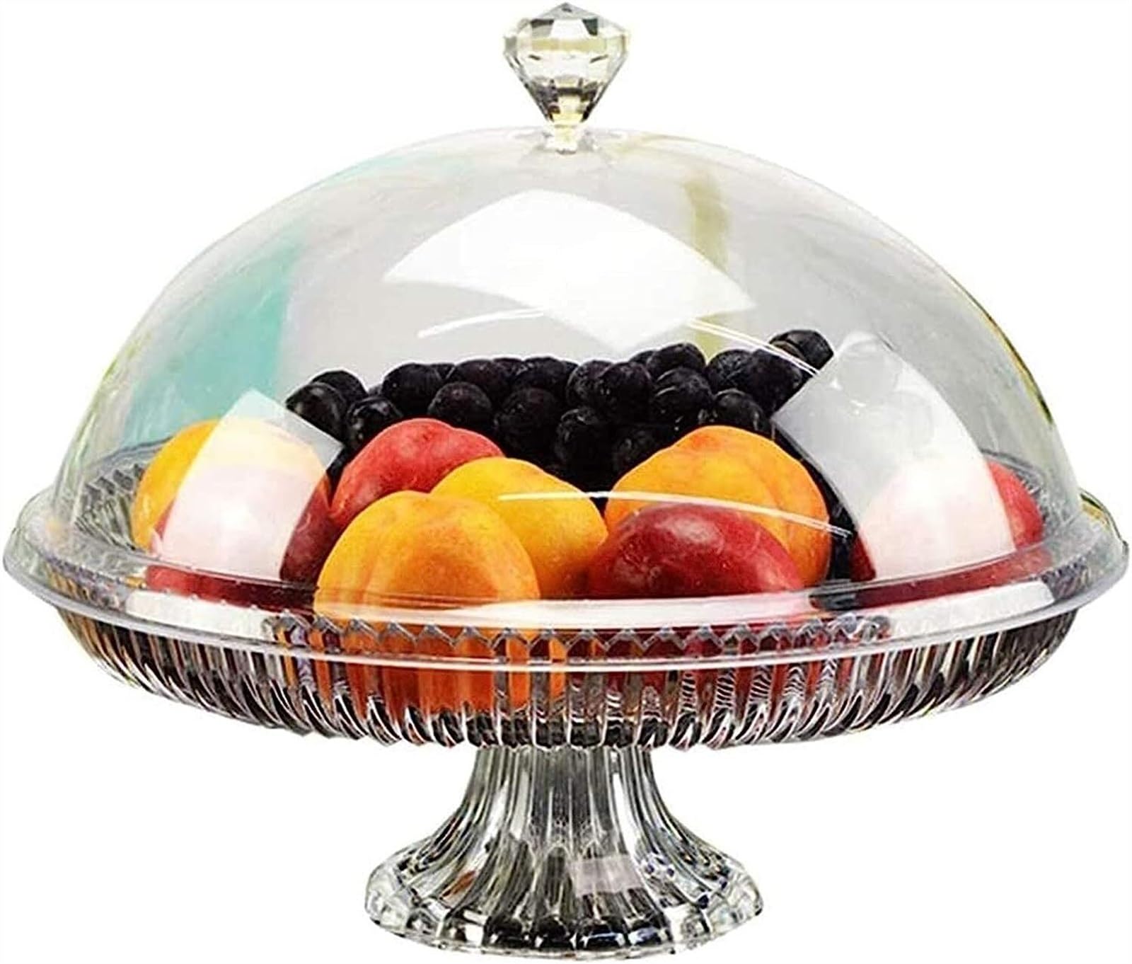 Plateau de fruits d'hôtel avec dôme de gâteau et couvercle plastique