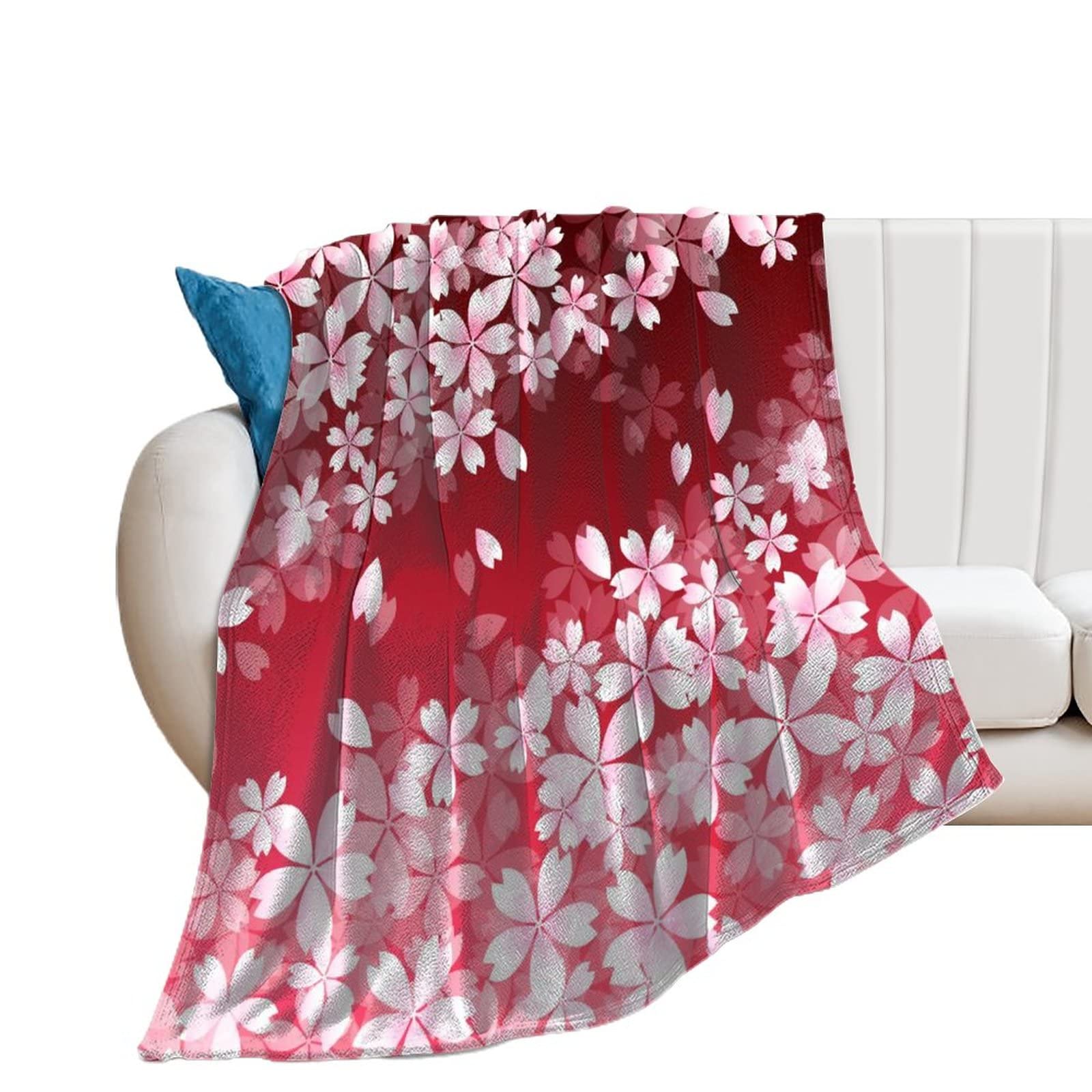 Couverture polaire fleurs pour vos soirées cocooning sur le canapé du salon