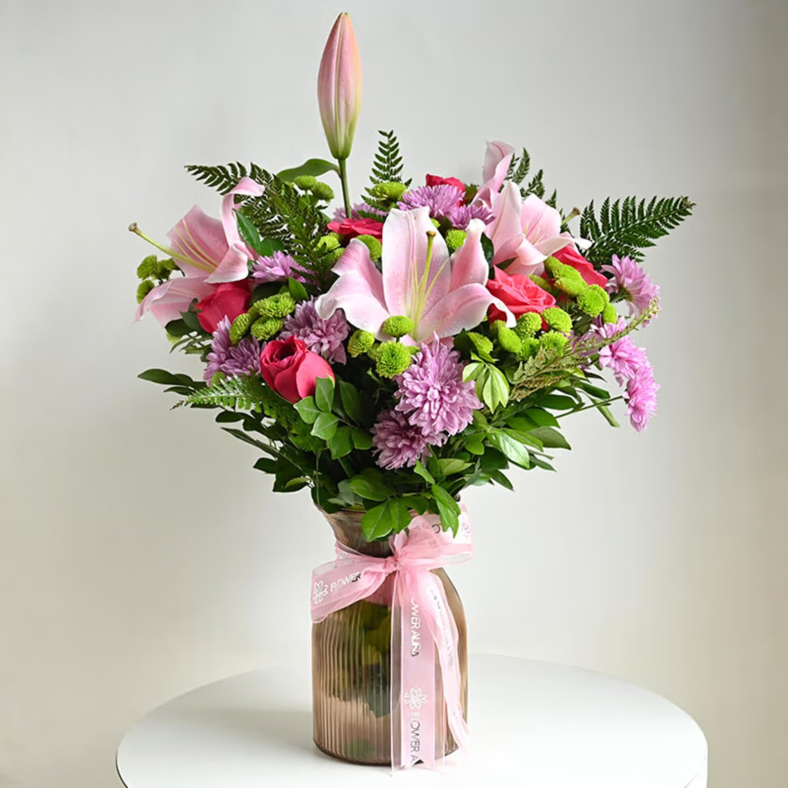 FlowerAura Premium Flower Bouquet of 7 Pink Rose, 1 Pink Lily, 8 Mix Color Daisy Flower In Vase For Birthday & Anniversary Gift, Mother's Day Gift, Romantic Gift, Father's Day Gift (Same Day Delivery)