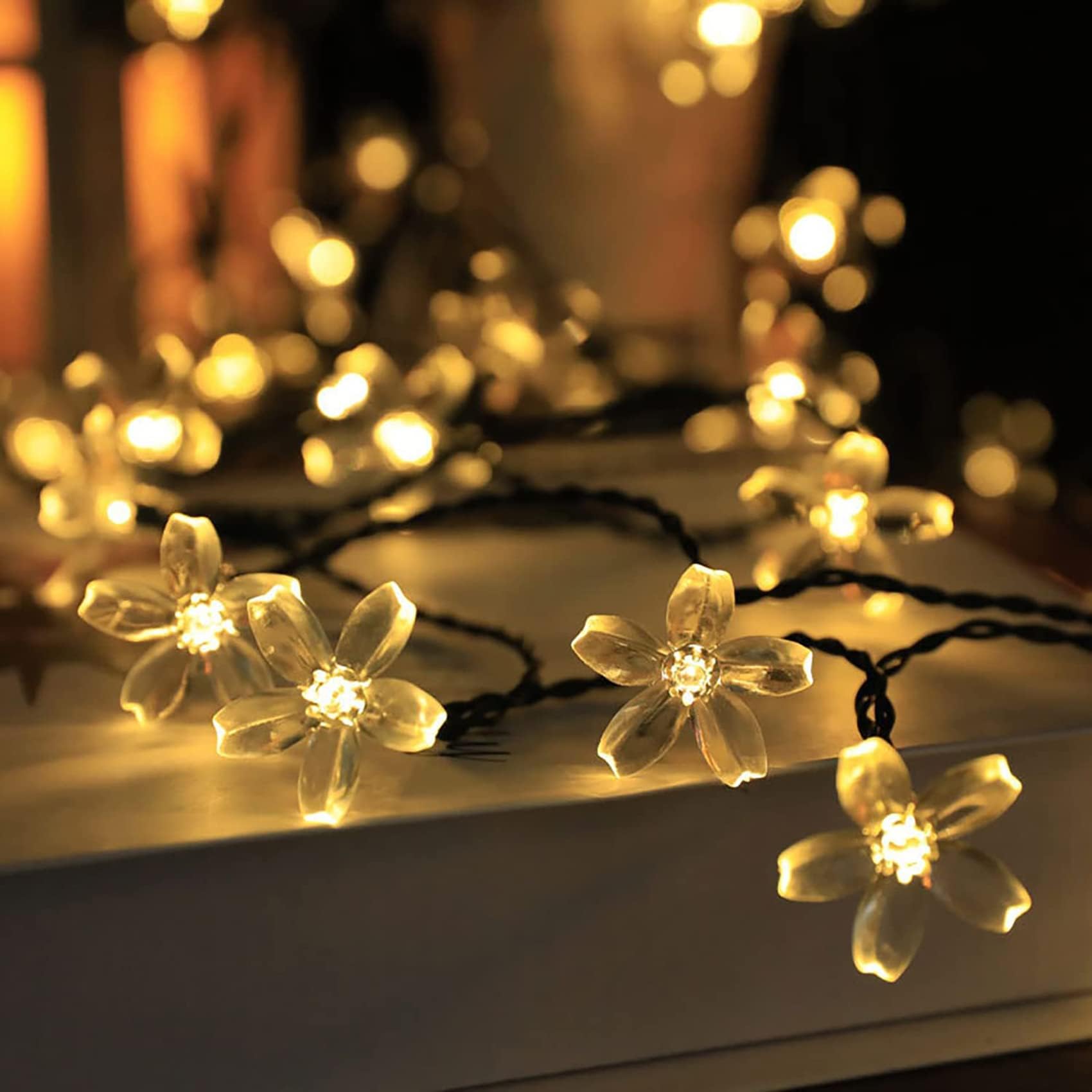 Luces de cadena solares al aire libre, con luces de hadas de flor de cerezo impermeables remotas 72 pies 200 Guirnalda de luces solares LED con 8 modos de iluminación (Blanco cálido)