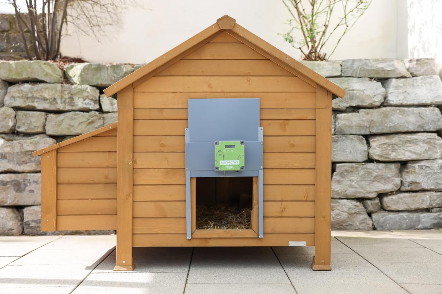 Kerbl EasyProtect 70590 installed on a different wooden chicken coop, door open