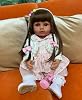 RXDOLL Reborn Baby Doll Vinyl Full Body Tan Skin African American 22 Real Black Interactive Girl Reborn Toddler Doll with Long Hair Beautiful Dress Accessories for Christmas Gift