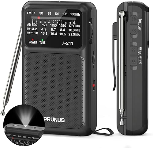 PRUNUS J-211 Radio portátil AM FM con carga USB y batería AA, radio transistor, recepción fuerte y altavoz claro, conector para auriculares, clip