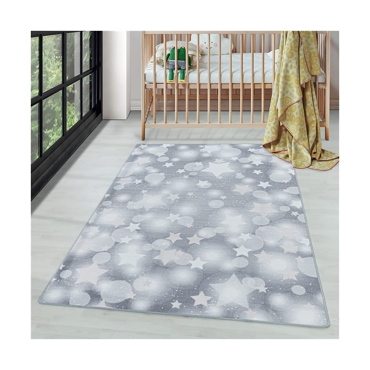 Tapis pour chambre d'enfant gris aux motifs d'étoiles pour de doux rêves