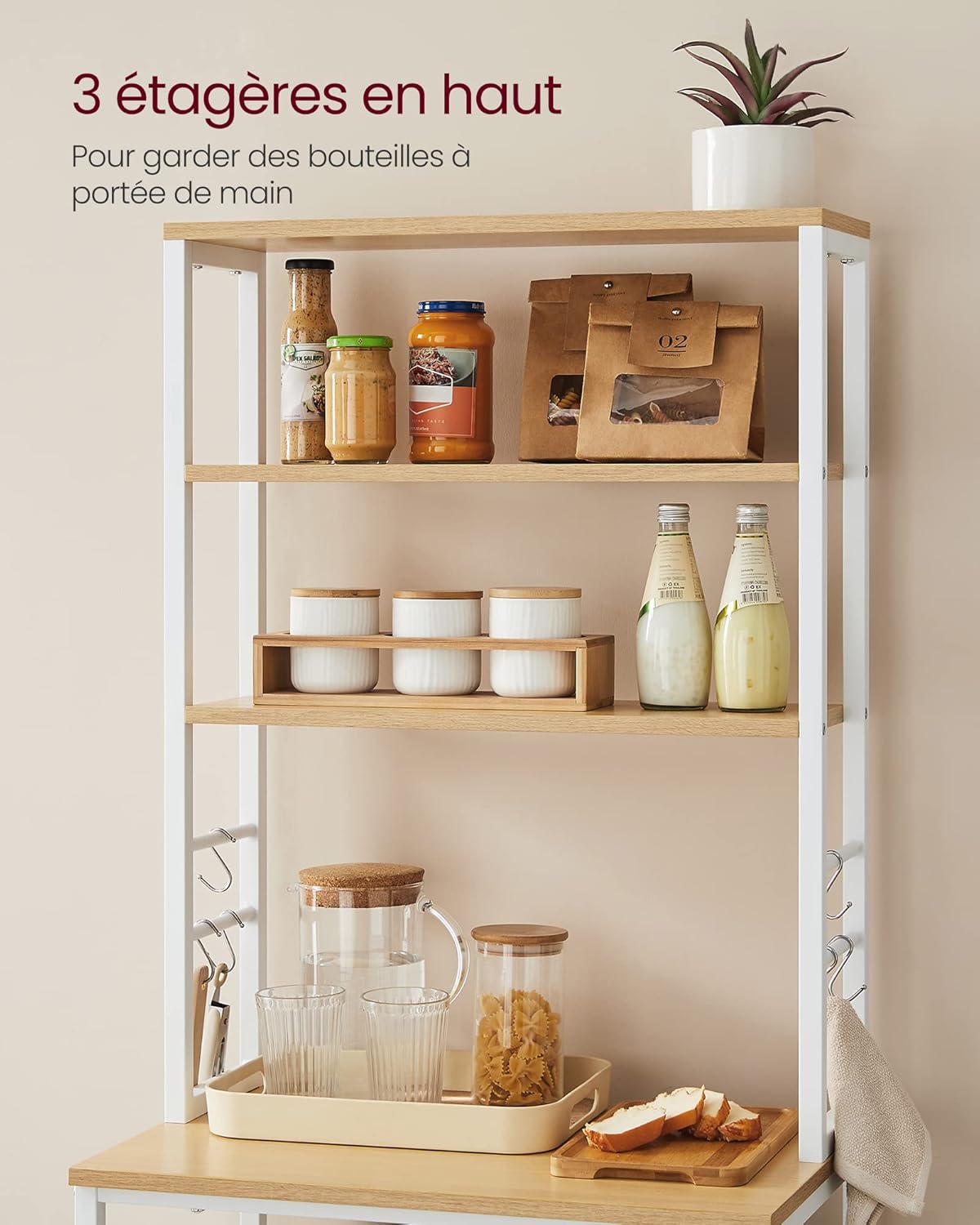 Close-up of the top shelves of the VASAGLE KKS024W09 Kitchen Shelf, showing bottles and jars.