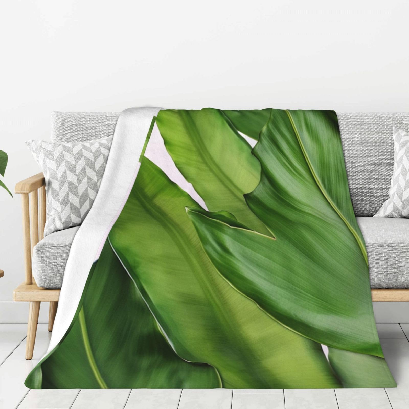 Couverture polaire feuilles de bananier pour vos soirées cocooning sur le canapé