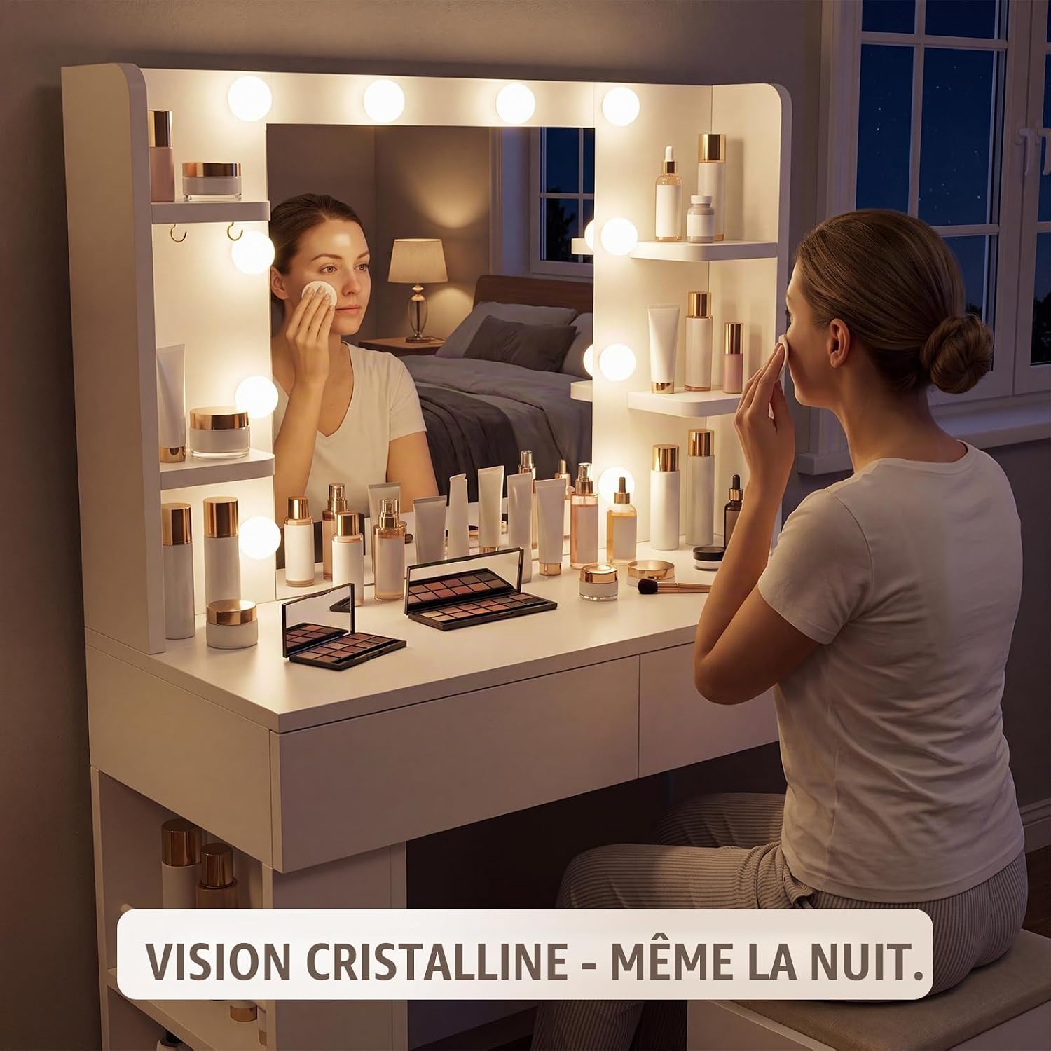 Woman applying makeup in front of the illuminated vanity mirror at night