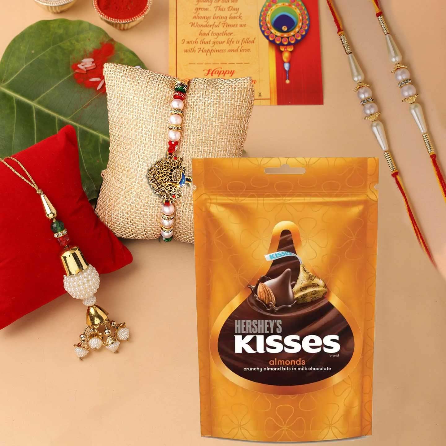 CraftVatika Rakhi Chocolate Gift Combo, Rakhi Set of 4 for Brother and Bhabhi Kids, Hersheys Kisses Chocolate with Peacock Lumba Pearl Rakhi for Bhaiya Bhabhi on Rakshabandhan (B0B7RGVGBK) Amazon Price History, Amazon Price Tracker