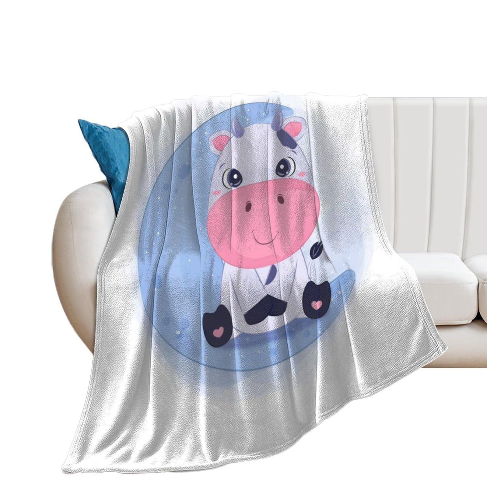 Couverture de lit vache en polaire pour réchauffer vos soirées sur le canapé salon