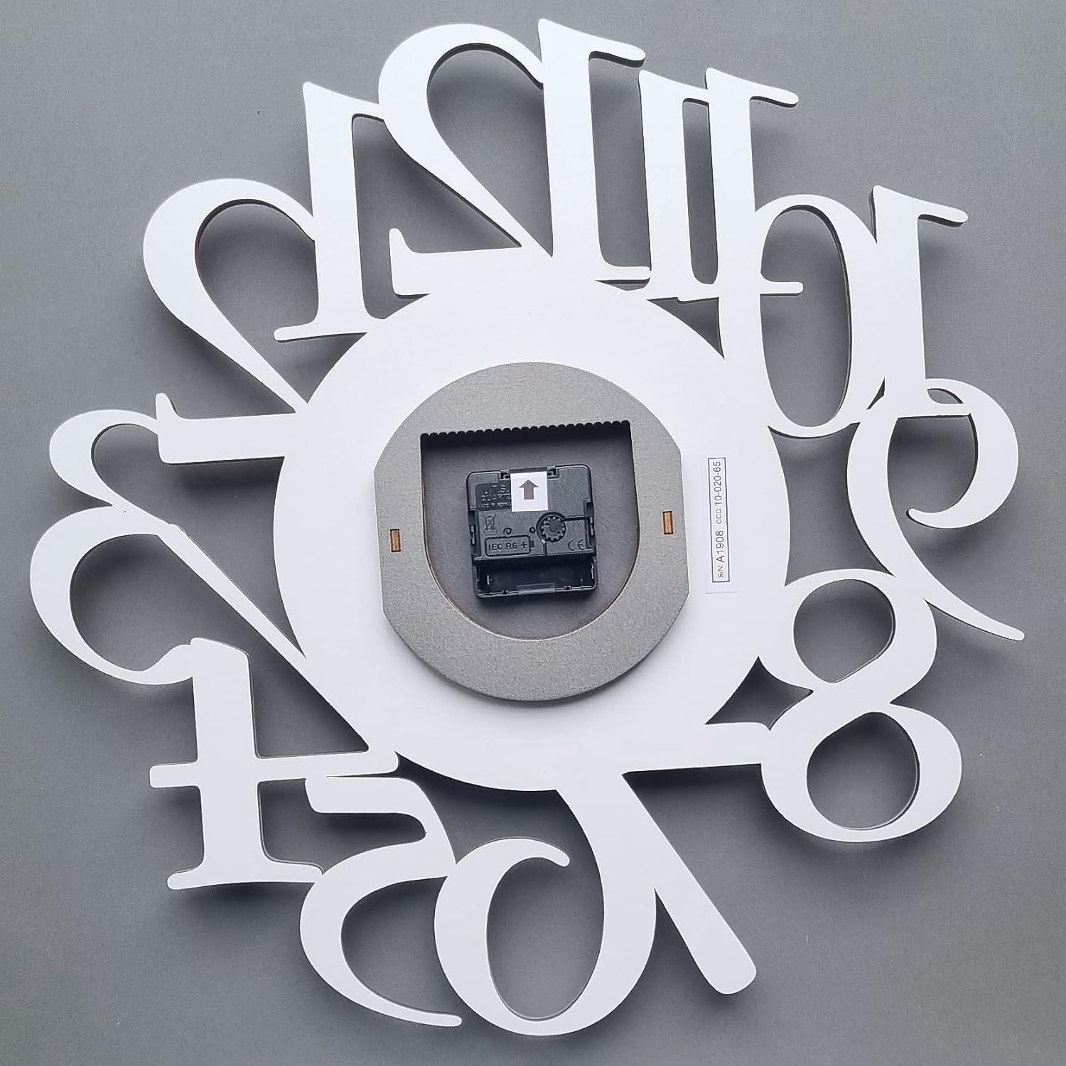 CalleaDesign, Particular Modern Wall Clock in Ruby red. Russell Model, Silent, Reliable, Size 44x45 cm, Made in Italy.