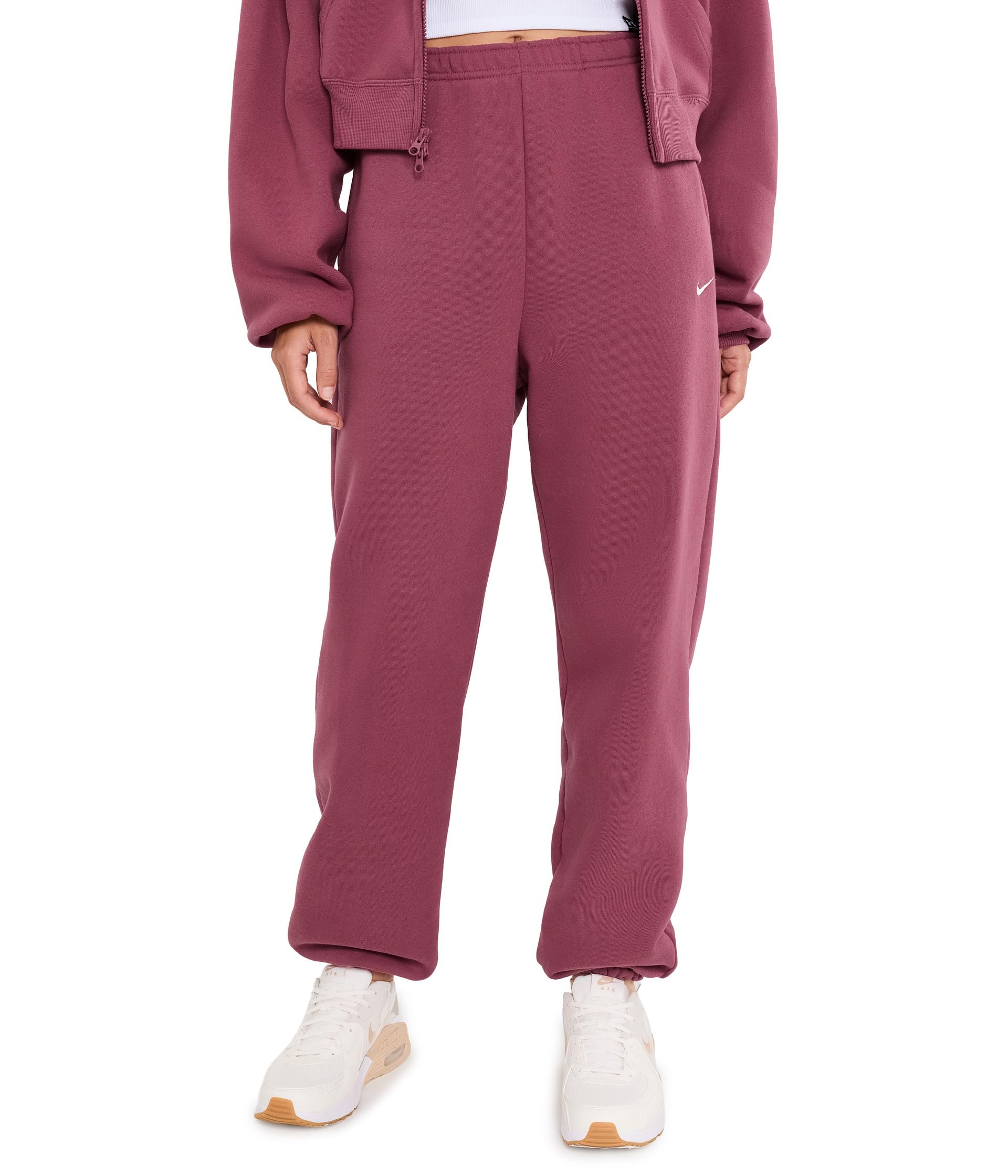 Nike IM8074 Studio Fleece spodnie oversize z materiału średniej grubości z wysokim ściągaczem i ściągaczami dla kobiet