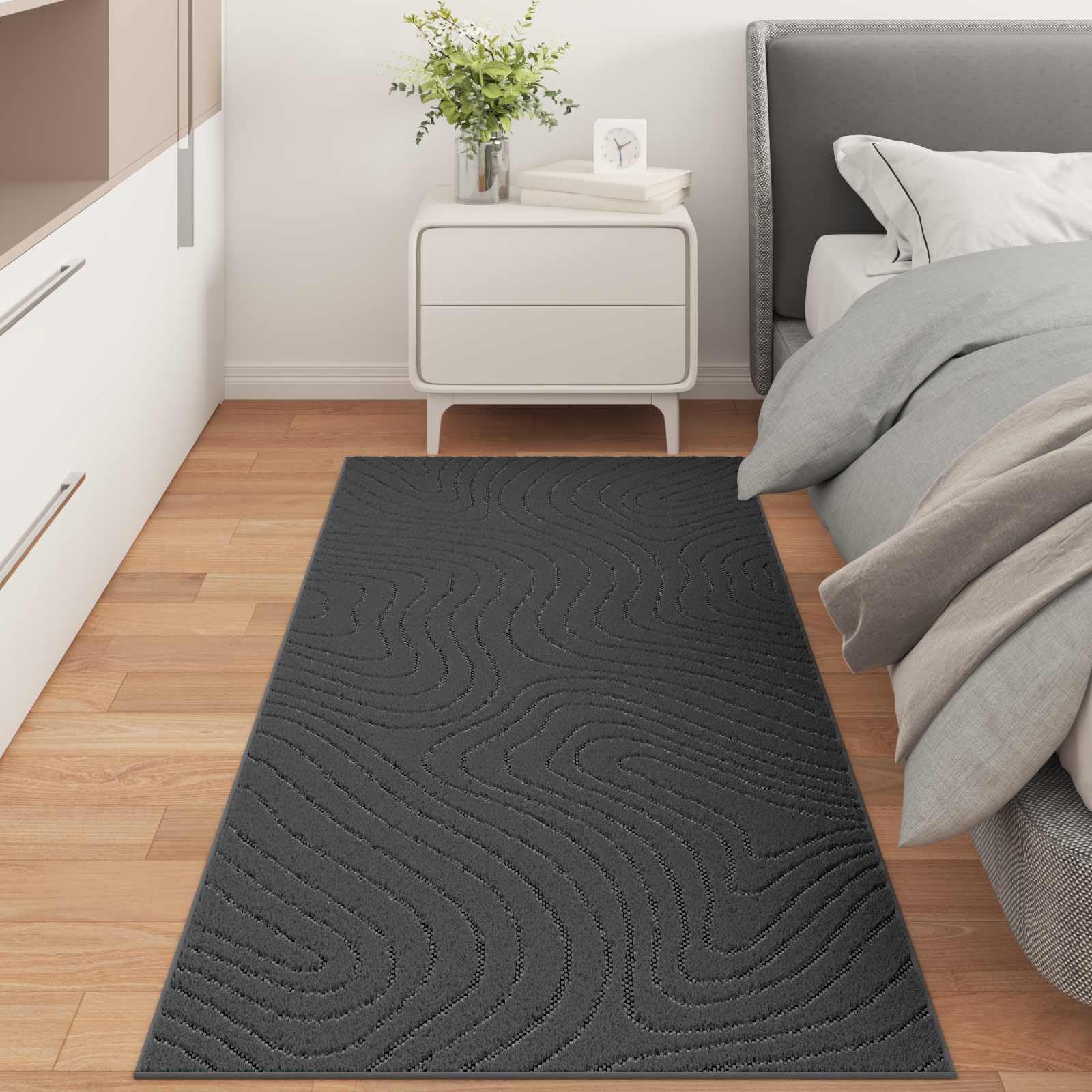 Tapis de surface HUARTE anthracite pour réchauffer le sol du salon
