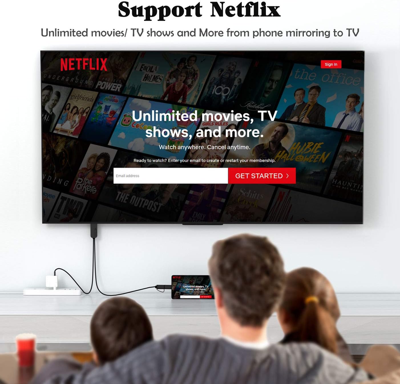 People watching Netflix on a TV mirrored from a phone using the YEHUA HDMI adapter