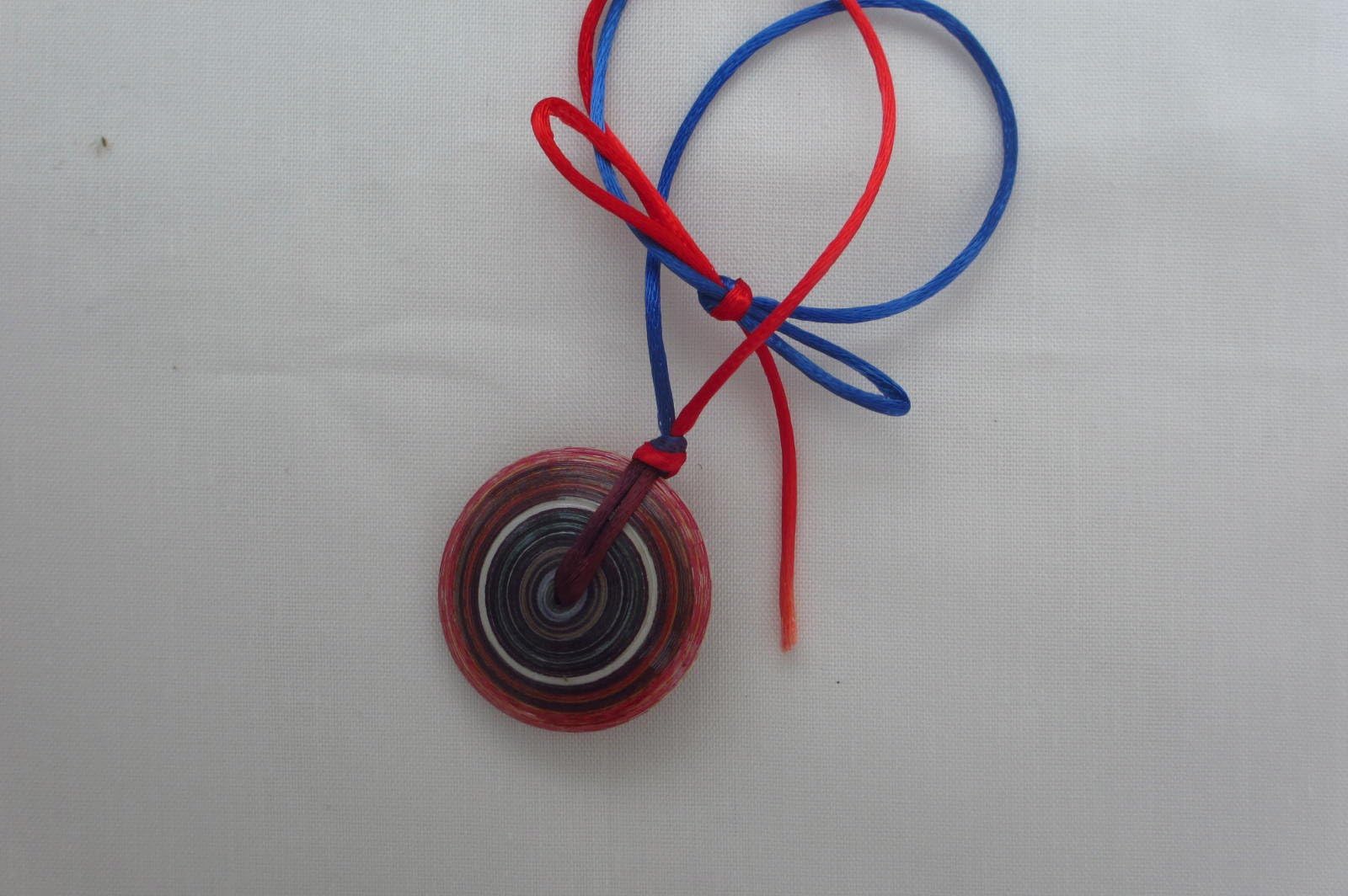 Coiled Magazine Pendant