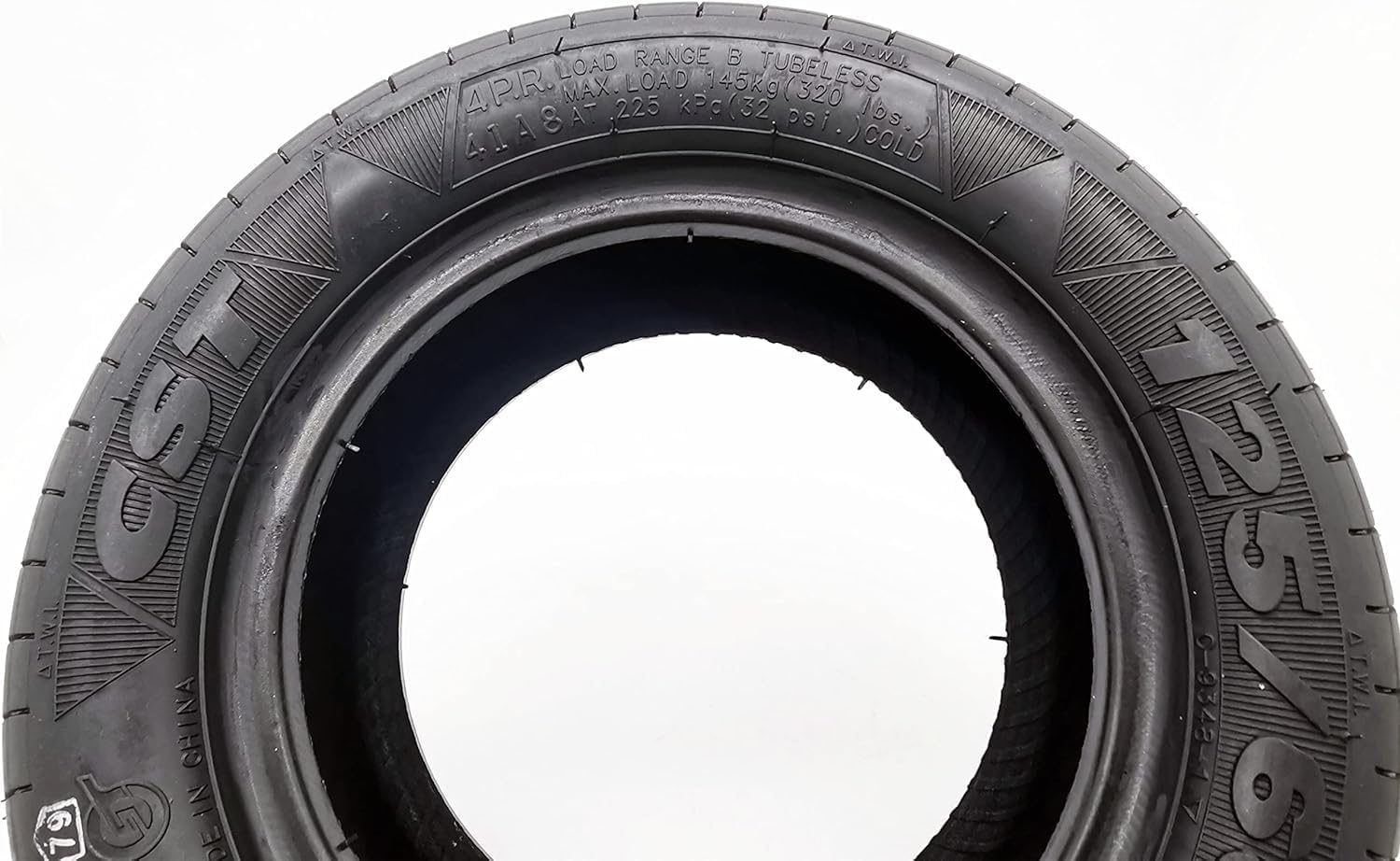 Tire sidewall showing pressure and load information