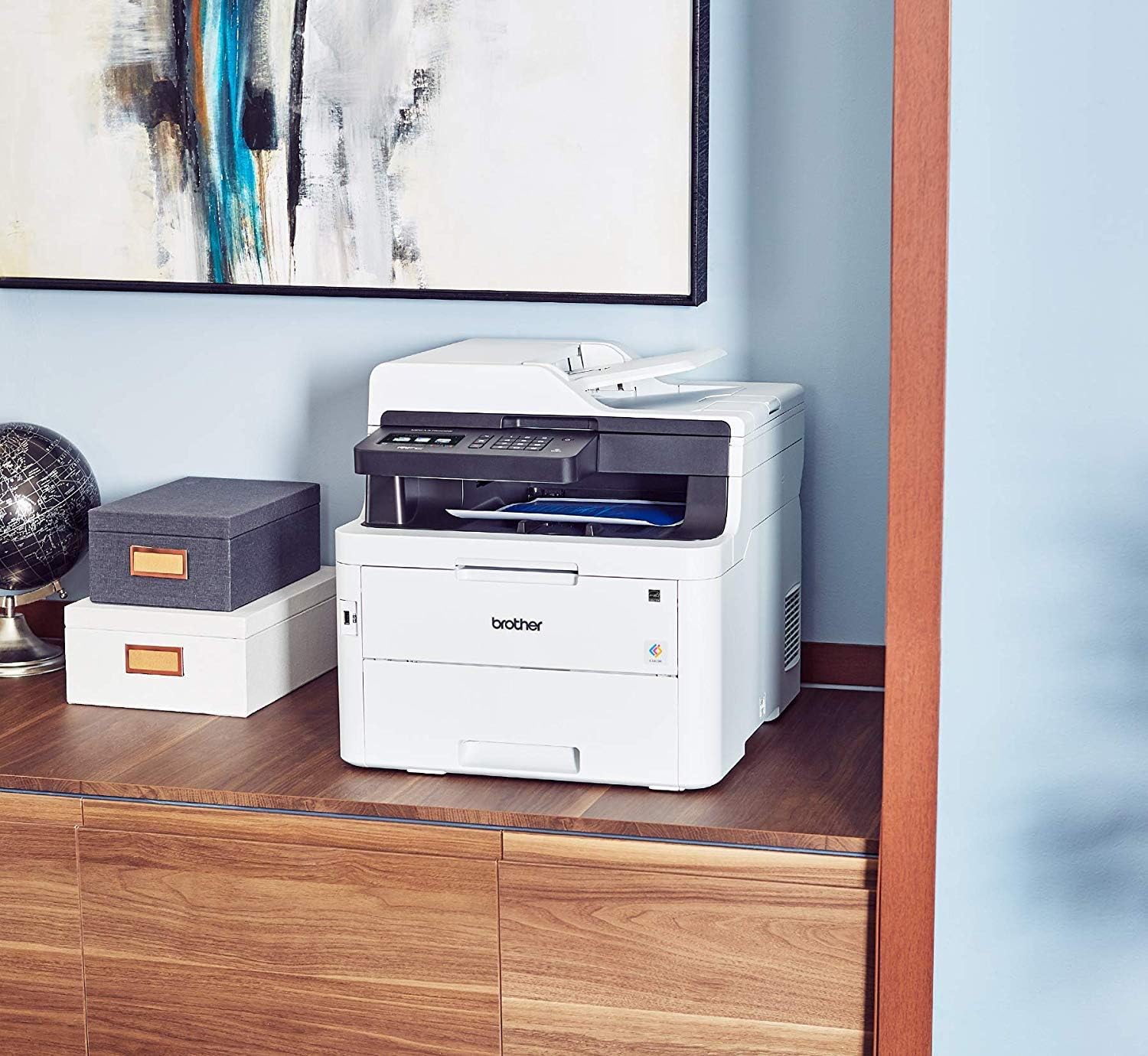 Brother MFC-L3750CDW printer placed on an office desk