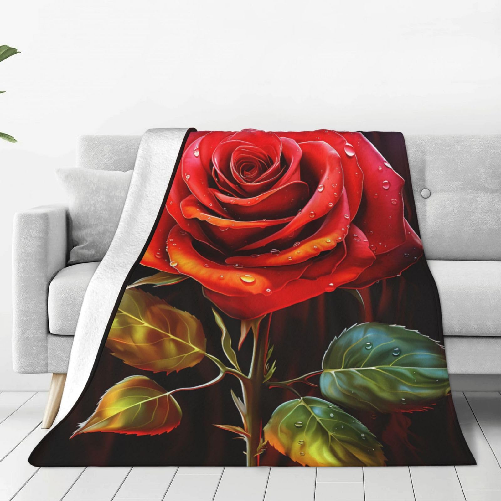 Couverture artistique rose rouge pour réchauffer vos soirées cinéma sur le canapé
