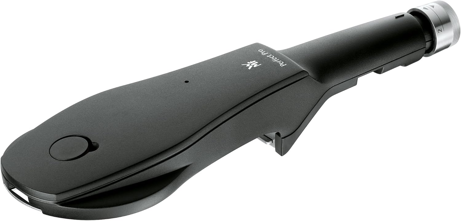 WMF Perfect Pro Pressure Cooker in use on an induction hob