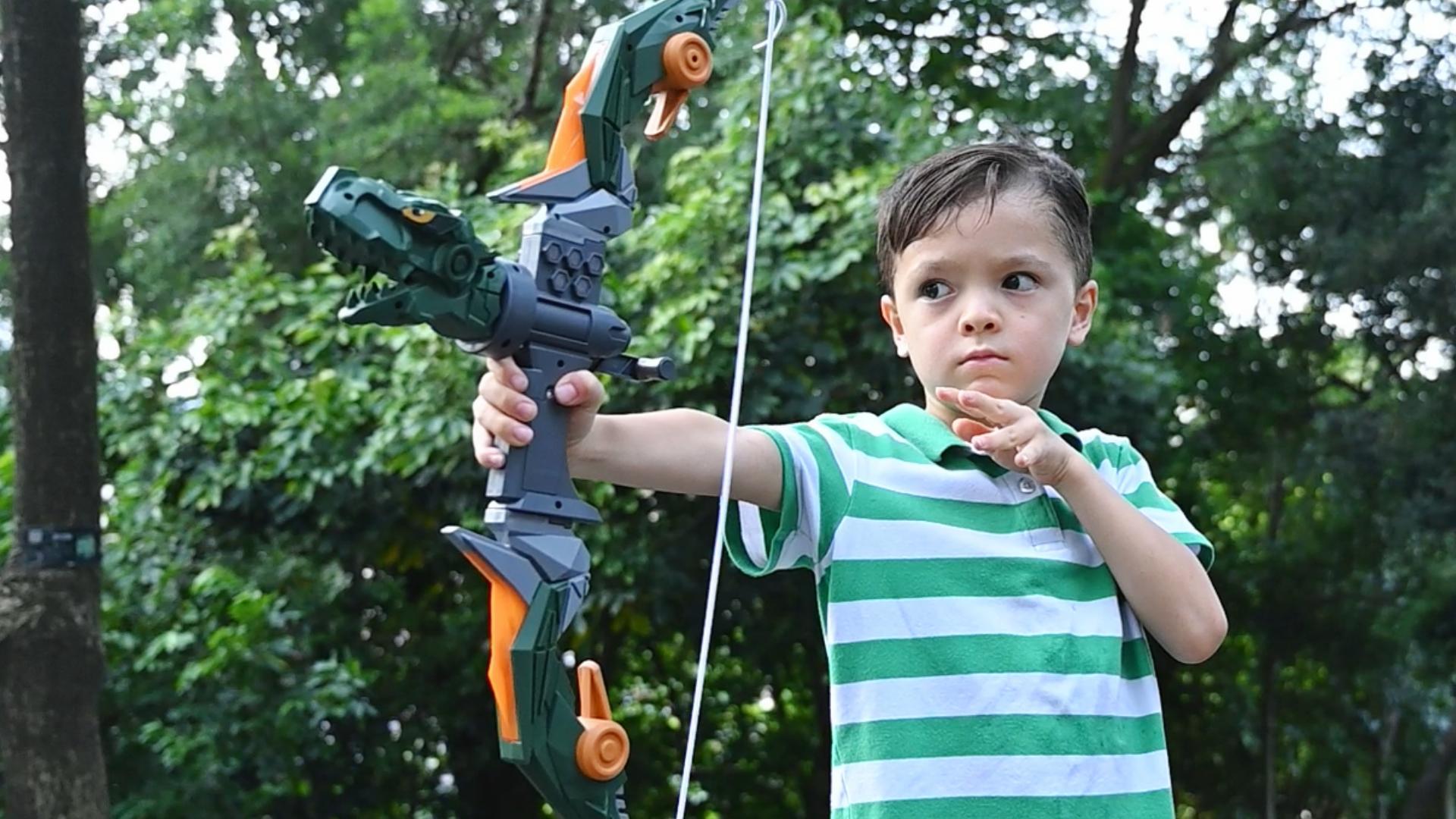 Set Arco E Freccie Per Bambini Con Dinosauro LED - 10 Frecce A Ventosa, Bersaglio E Faretra - Foto 8