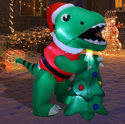Miniatura 5 de MorTime Dinosaurio inflable de Navidad de 5 pies con caja de regalo, accesorio inflable para patio, dinosaurio verde animado iluminado con sombrero