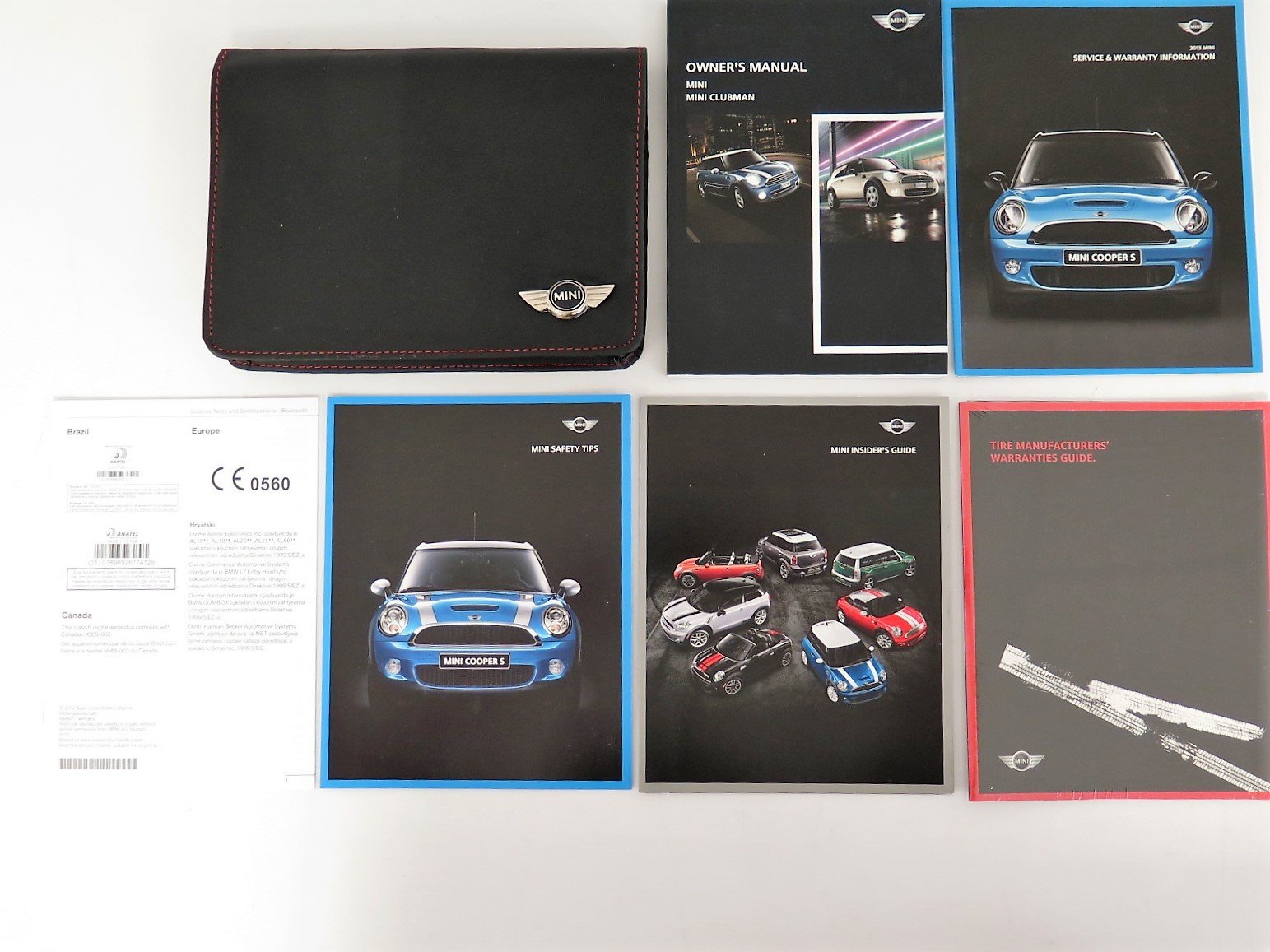 Black folder with Mini logo, likely containing the owner's manual set