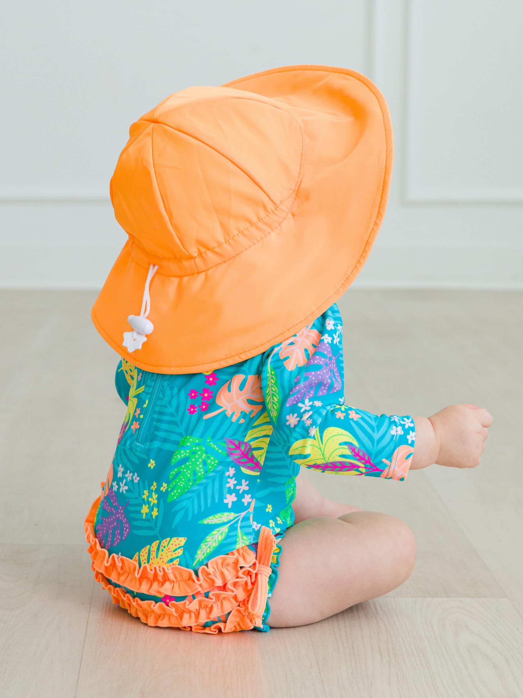 RuffleButts Costume da bagno intero a maniche lunghe con protezione solare UPF 50, a pois, con cerniera, a pois color acqua brillante, 3-6 m