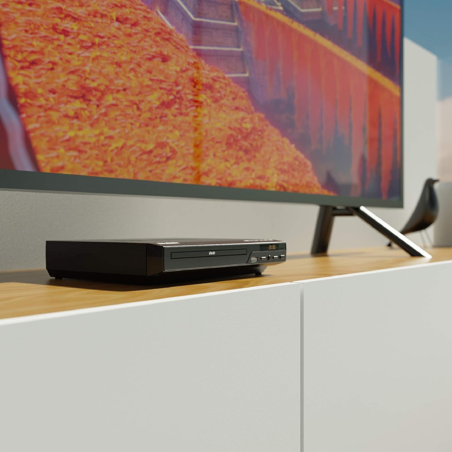 Majority Scholars DVD Player connected to a television via HDMI, placed on a media console.