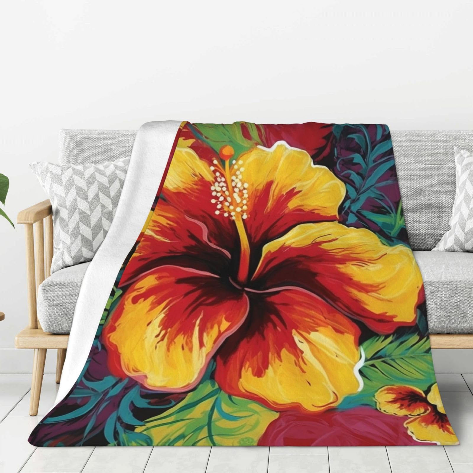 Couverture en flanelle à motif hibiscus, plaid coloré et douillet pour vos soirées canapé