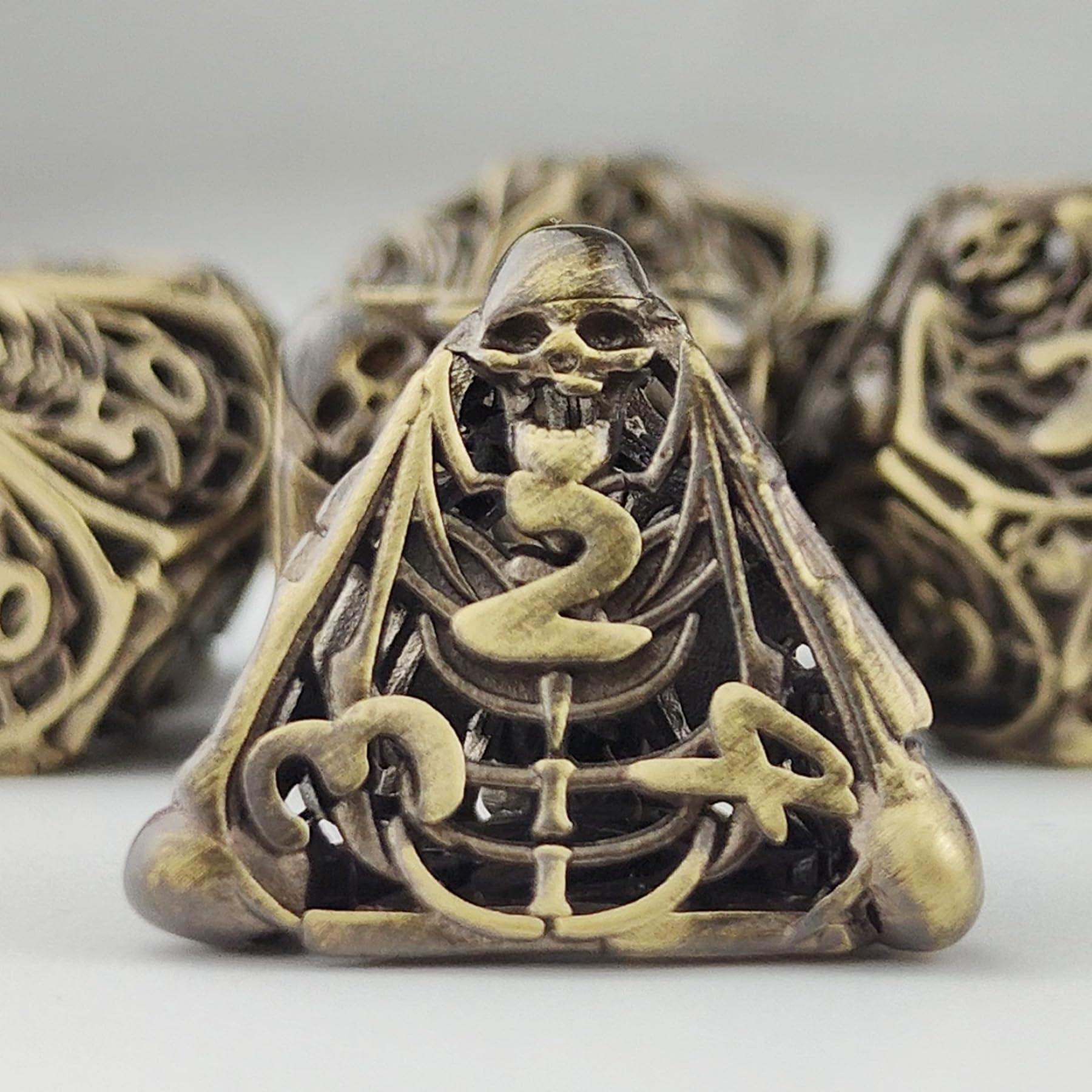 Hollow Skull DND Dice Set Metal Polyhedral Dice Dungeons and Dragons Dice Gifts 7 Piece Role Playing Dice Set for D&D Table Games Cards Pathfinder (Brass) — image 1
