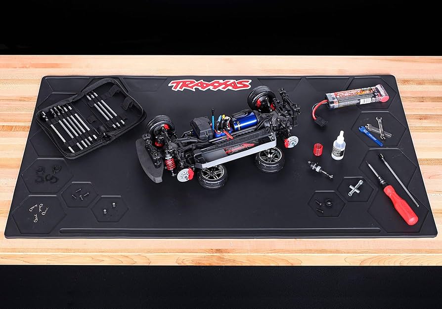 Amazon.com: Traxxas 3426 - Pit Mat, Rubber, 36x20x0.25 : Arts Amazon.com: Traxxas 3426 - Pit Mat, Rubber, 36x20x0.25 : Arts