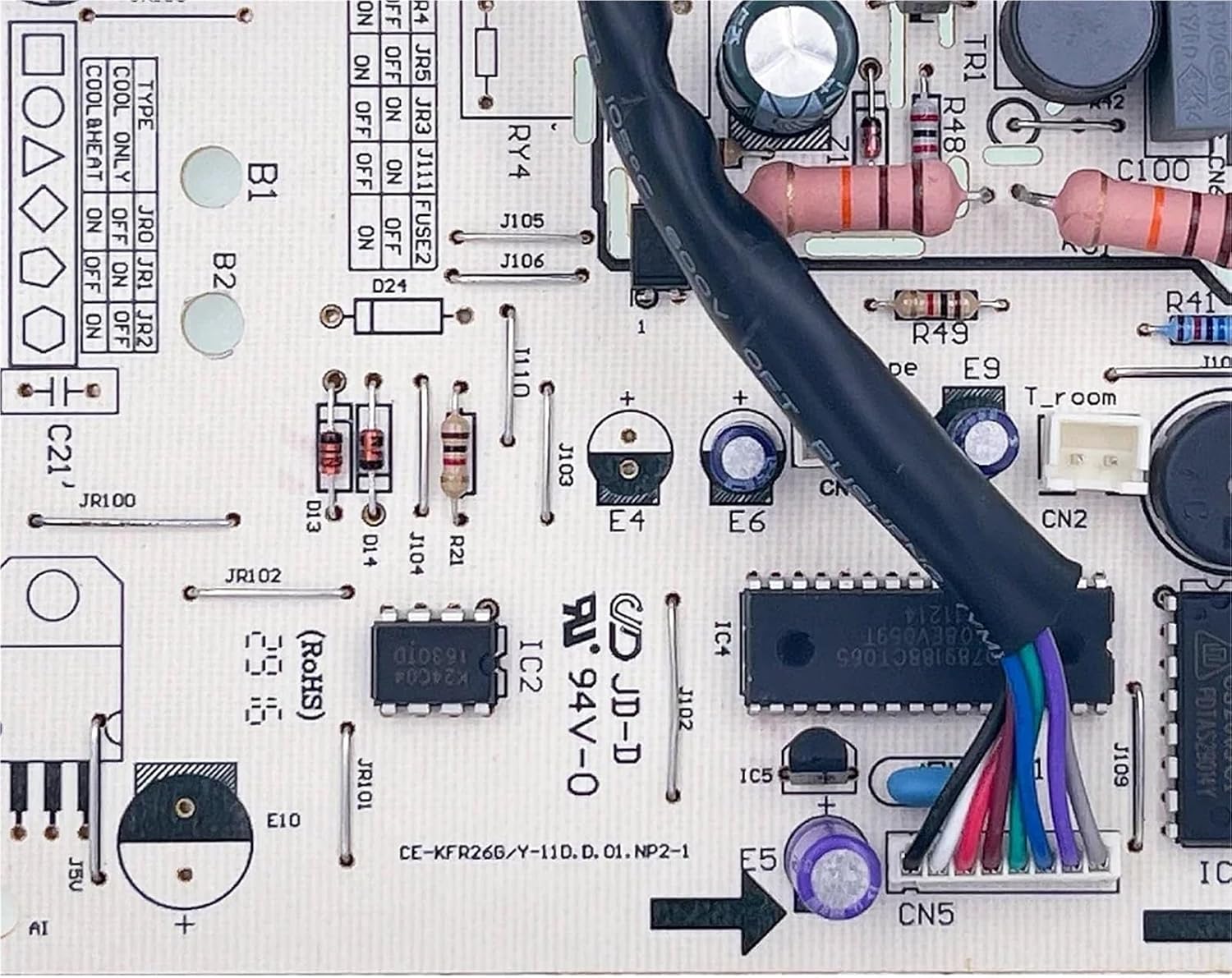 Close-up view of a section of the control board, showing connectors labeled CN1, CN2, CN3, CN4, CN5, and various resistors and capacitors. This image highlights connection points.