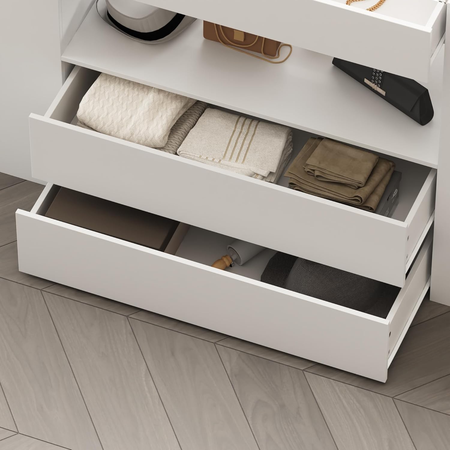 Drawers filled with neatly folded clothes and textiles