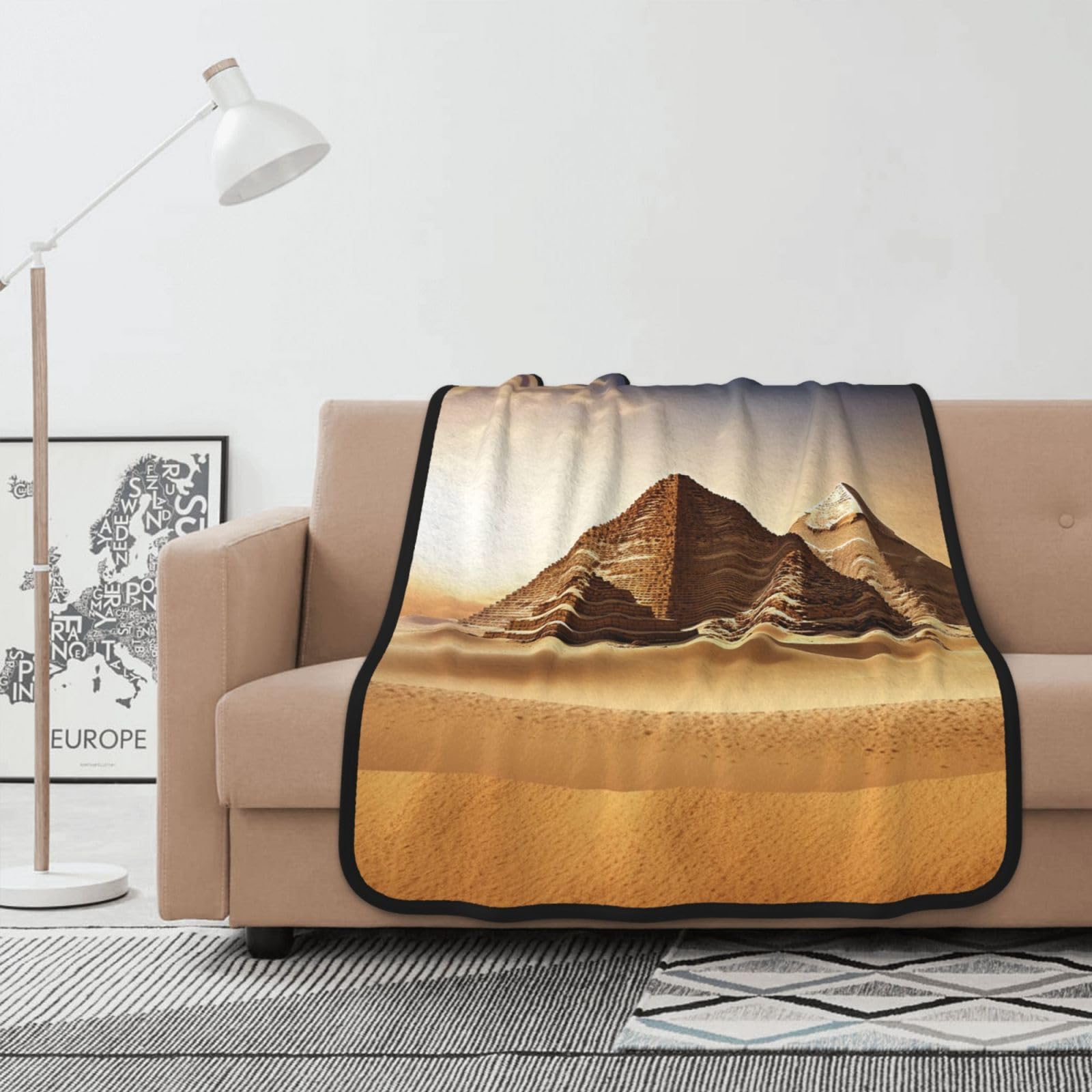 Couverture polaire pyramides jeté de canapé pour vos soirées cocooning confort