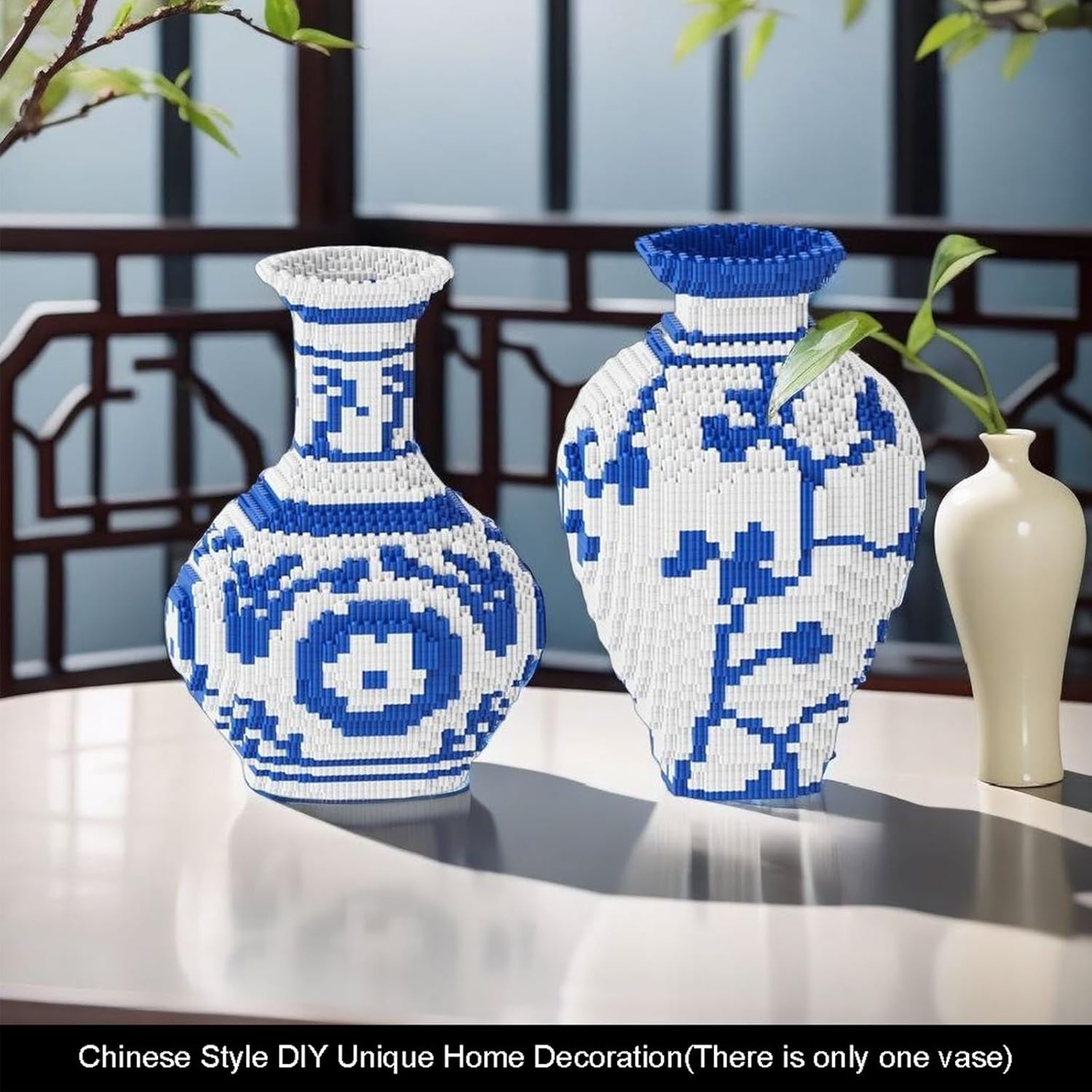 Two assembled JQARCH Blue and White Vases, one with flowers, showcasing different designs