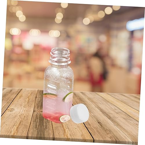 Miniatura 7 de Housoutil Mini nevera Mini refrigerador Mini frigorífico Botella de plástico de 3.4 fl oz: 30 botellas de bebidas reutilizables Contenedor