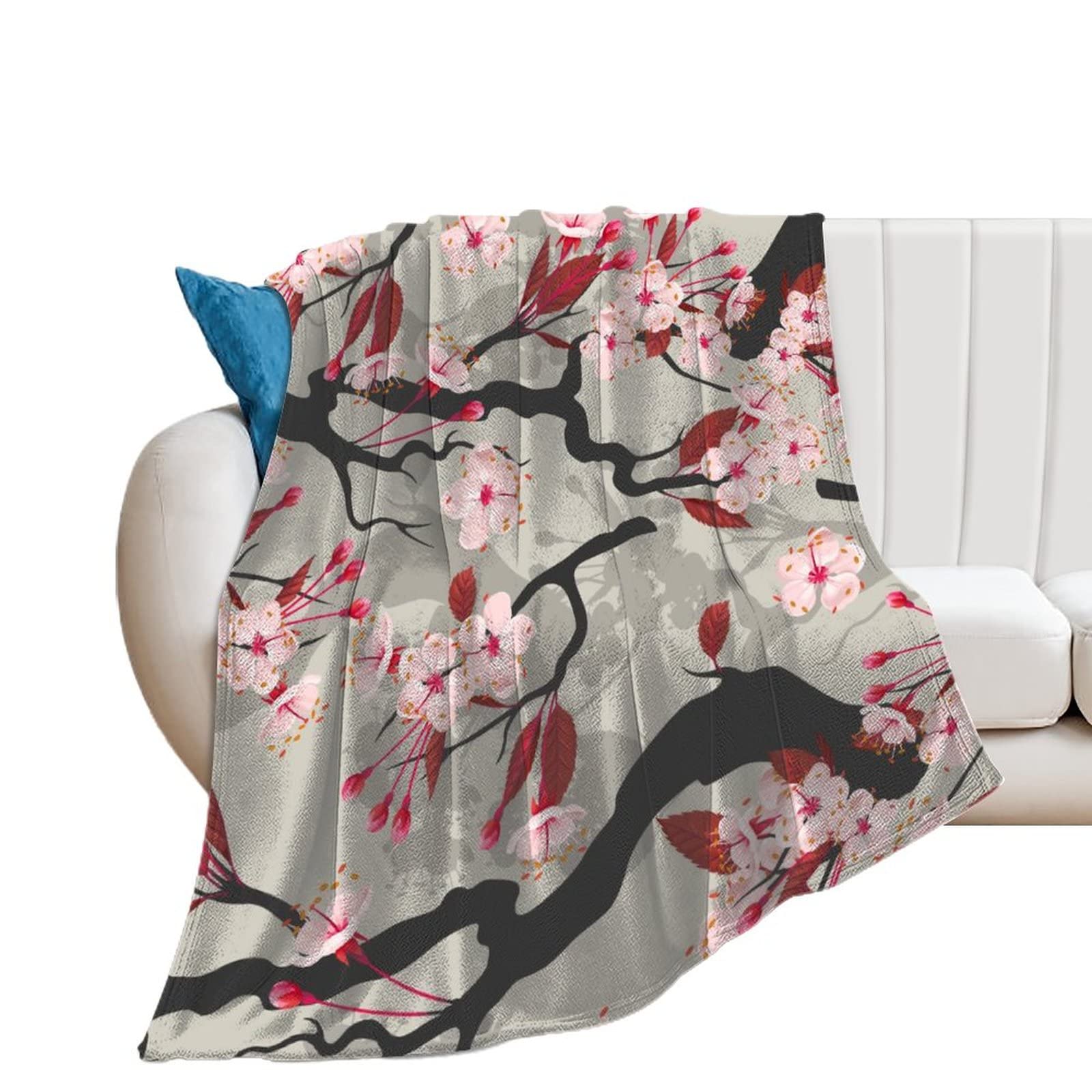 Plaid canapé flanelle douce et couverture polaire fleur de pêche pour salon cozy