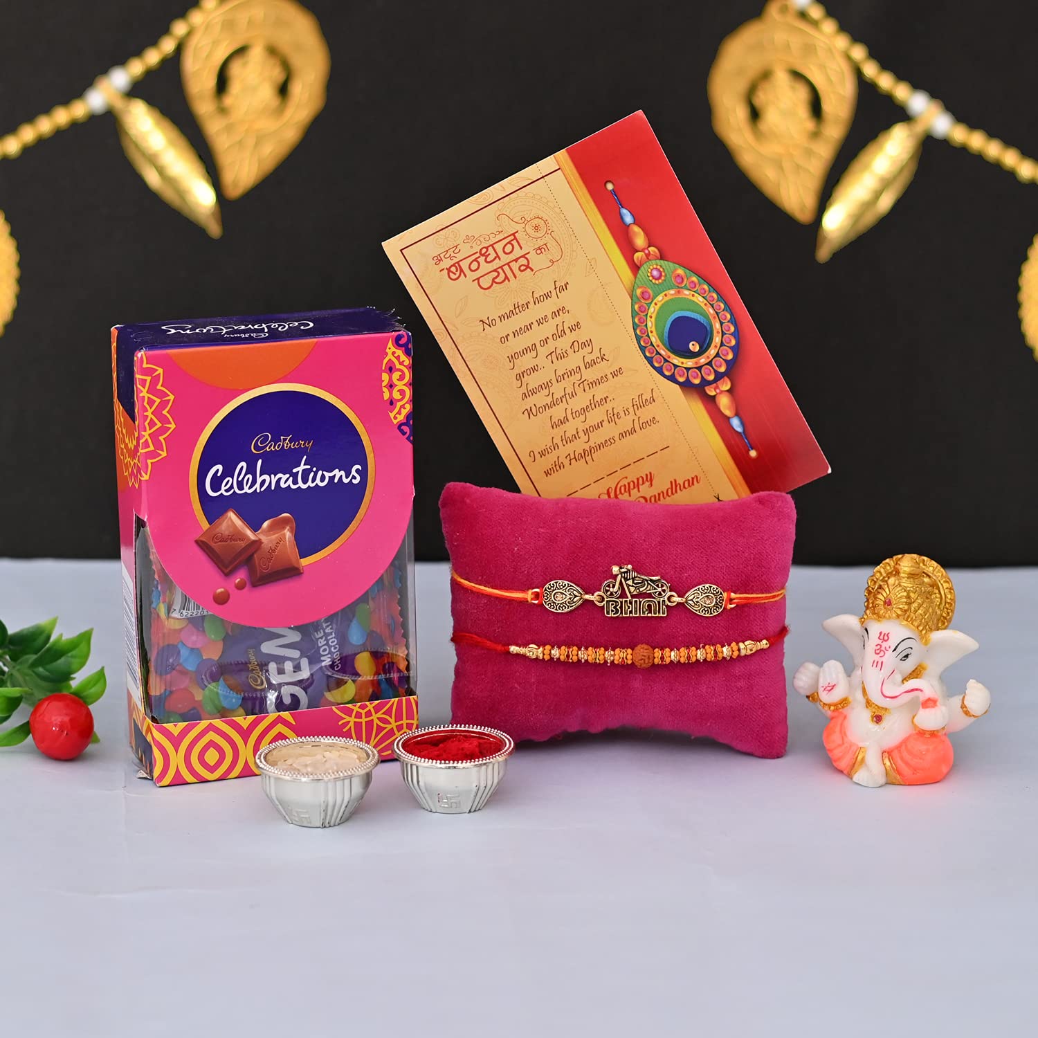 Rakhi for Brother with Ganesh Gift Combo, Rakhi with Chocolate for Bhaiya Kids, Rakhi Set of 2 with Cadbury Celebration Chocolate Gift Pack, Greeting Card, Tilak Set (B09B9SCNCP) Amazon Price History, Amazon Price Tracker