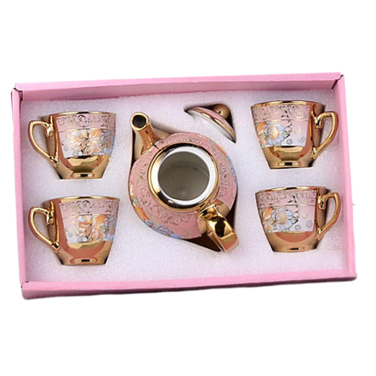 Théière et tasse à thé en vaisselle artisanale d'exception avec soucoupe