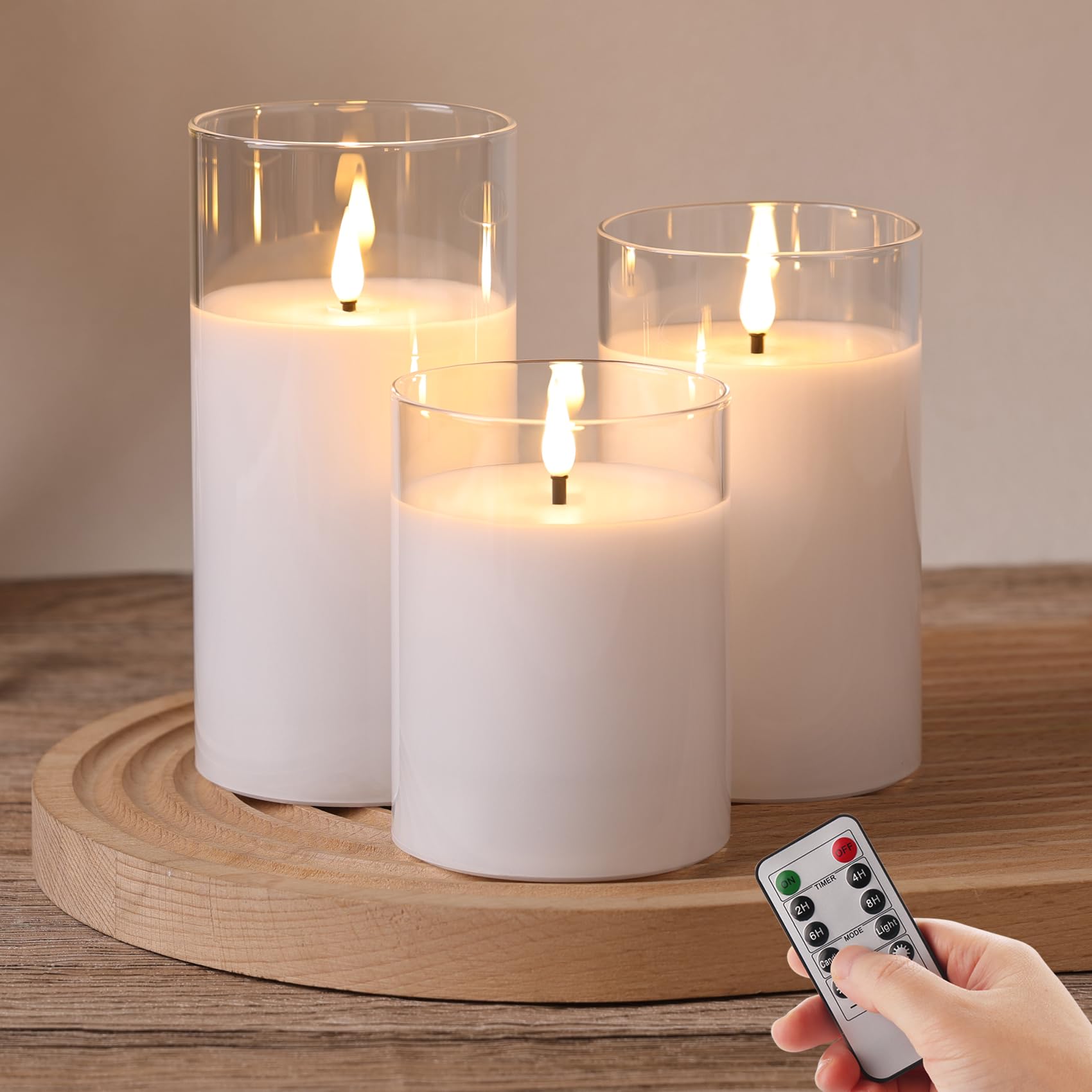Eywamage Candele cilindriche in vetro trasparente, senza fiamma, tremolanti in movimento, candele a LED in vera cera a batteria, con telecomando, decorazione per la casa, set da 3