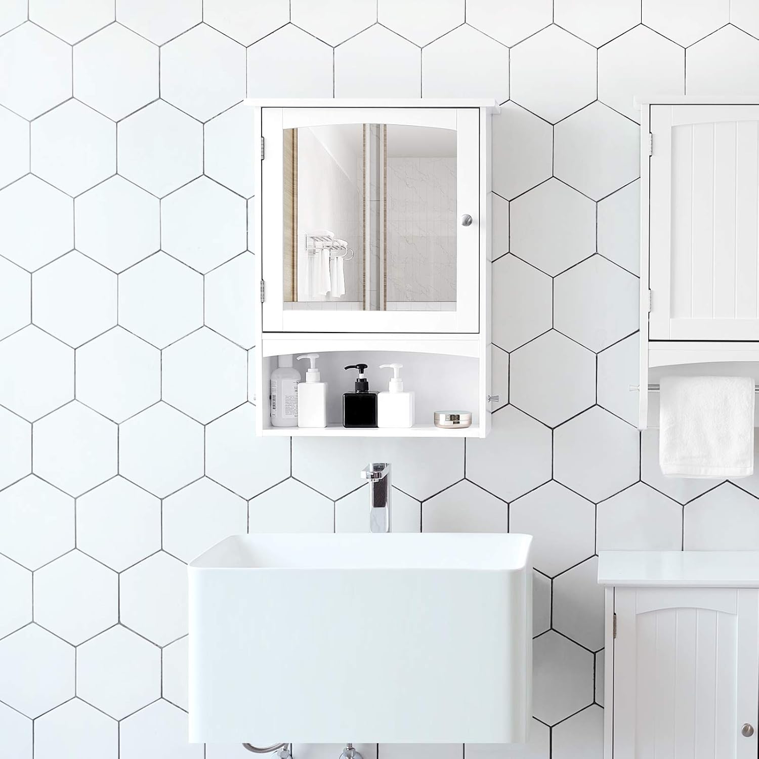 Image showing the interior of the VASAGLE UBBC21WT mirror cabinet with the door open, revealing adjustable shelves and an open bottom compartment.