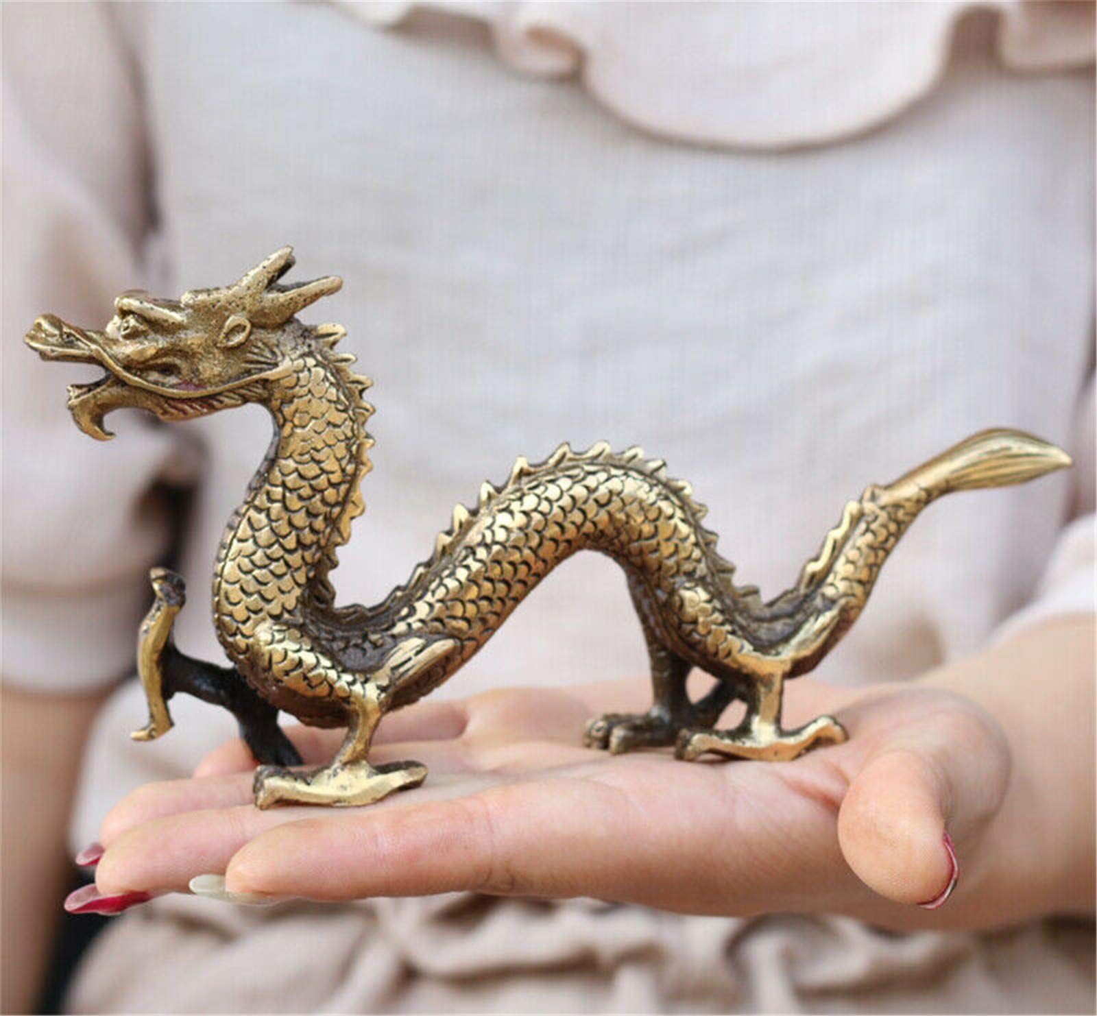 Statue de dragon chinois en cuivre vieilli fait à la main.