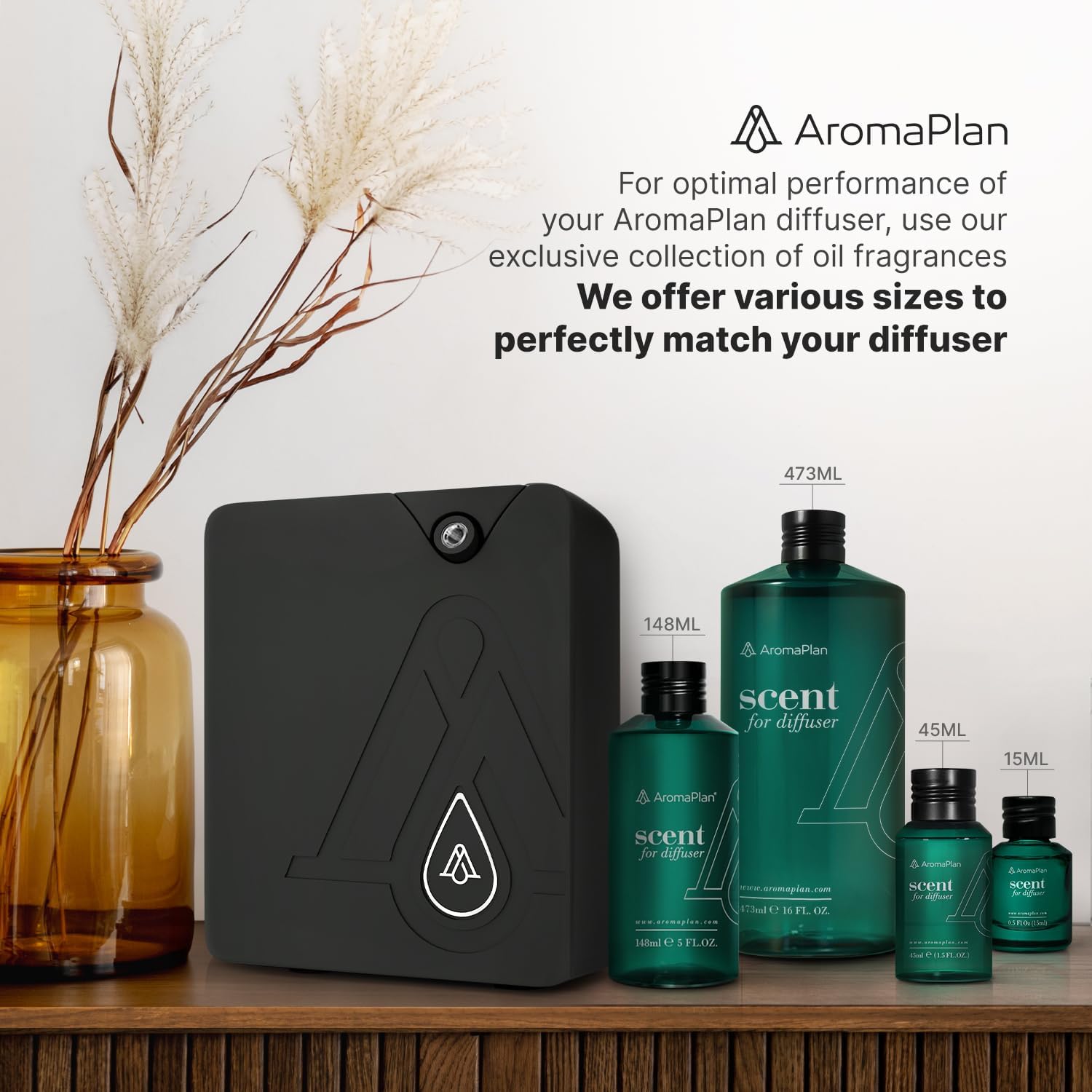 AromaPlan diffuser with various sizes of fragrance oil bottles