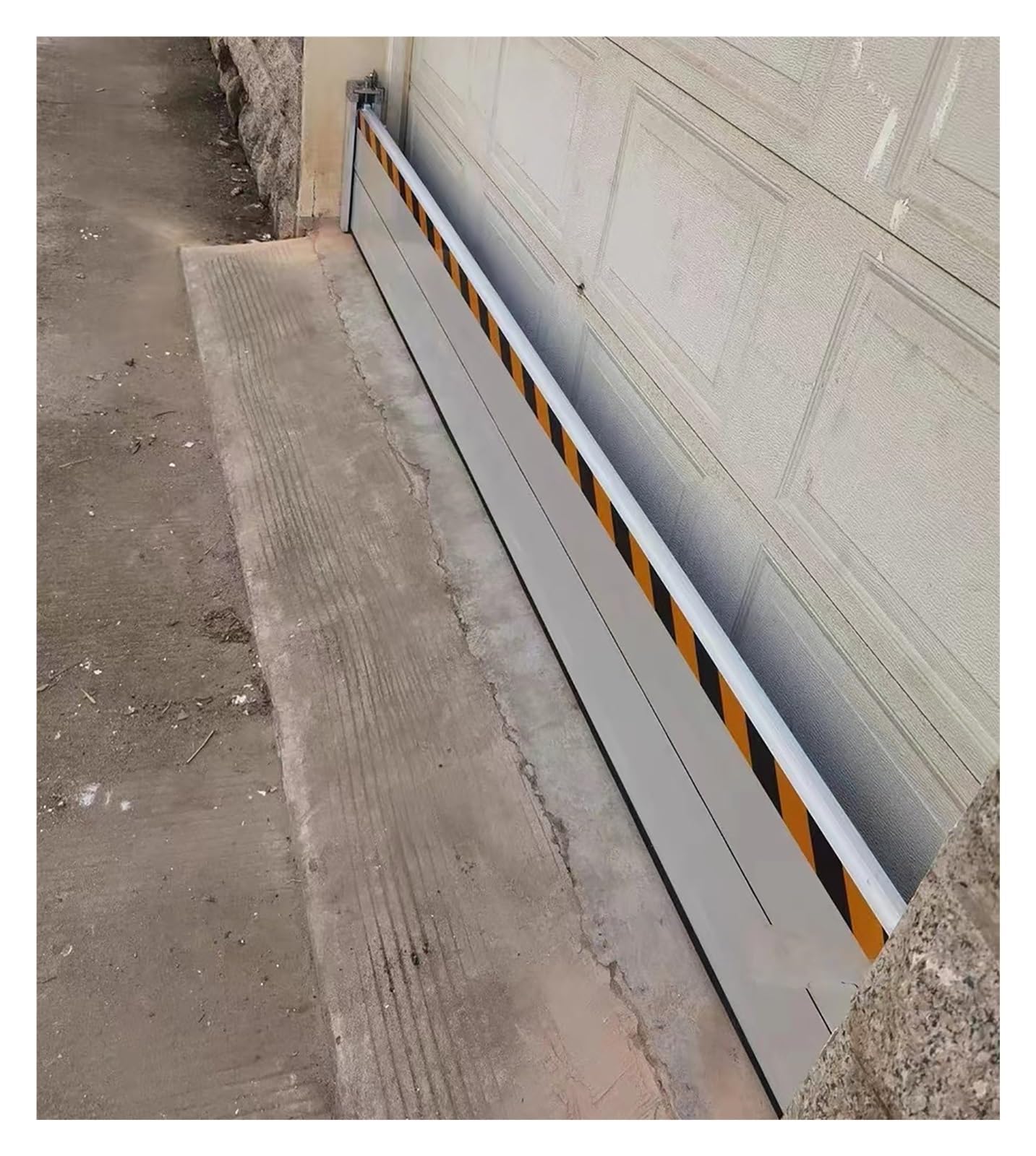 Inondation de garage évitée avec le bouclier de barrière d'eau personnalisé