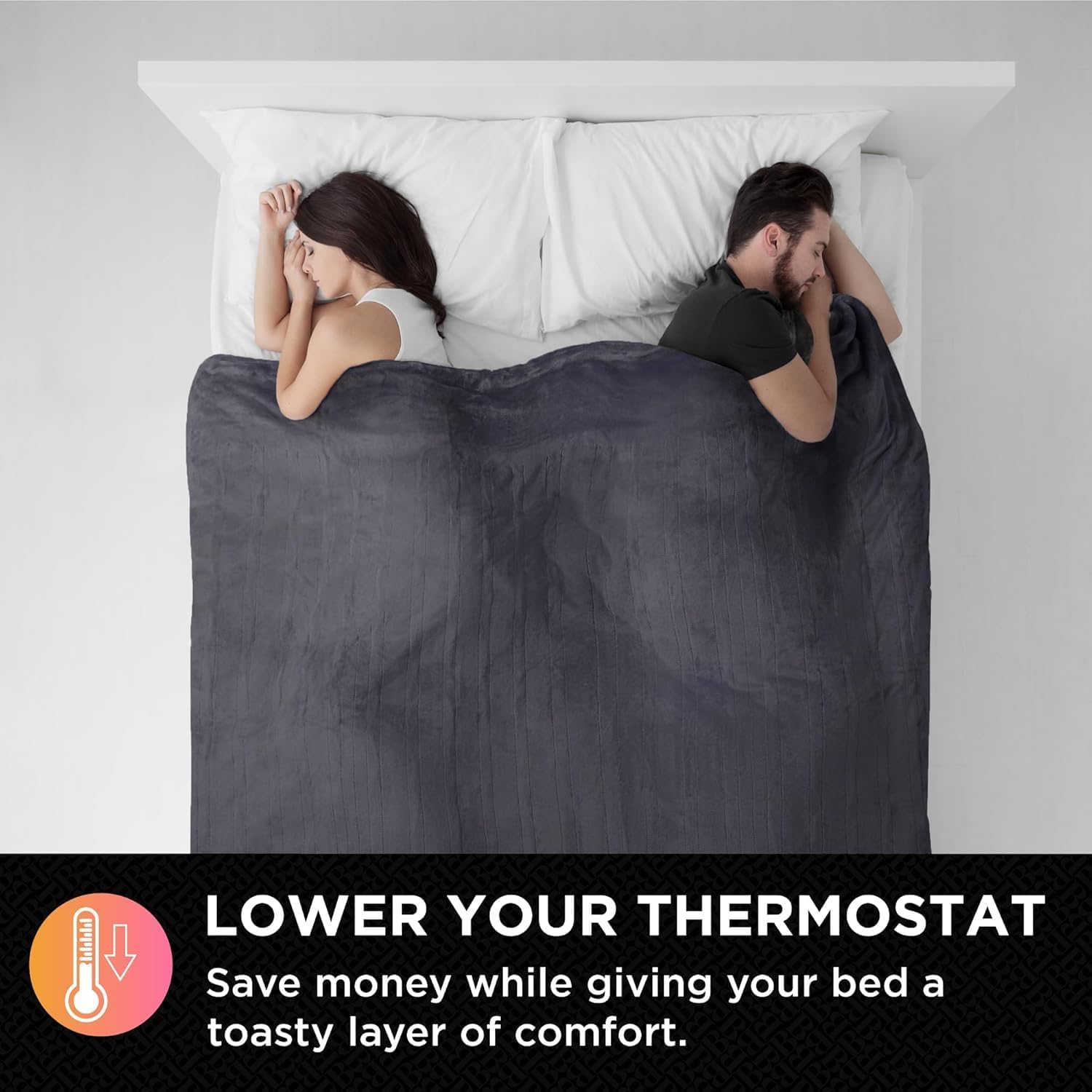 Couple sleeping under a heated blanket with text 'Lower Your Thermostat'