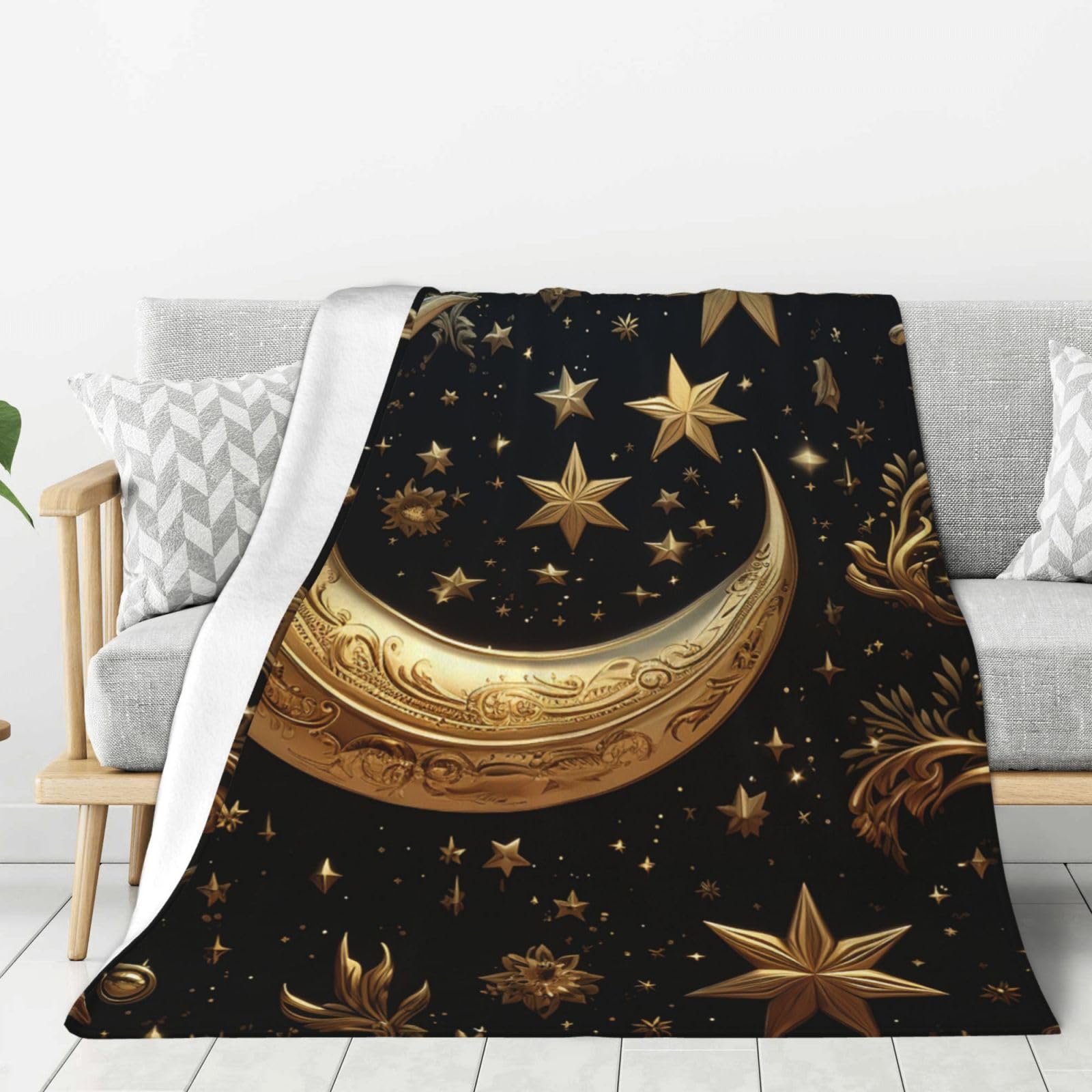 Plaid polaire doux motif lune et étoiles dorées pour vos soirées cocooning sur le canapé
